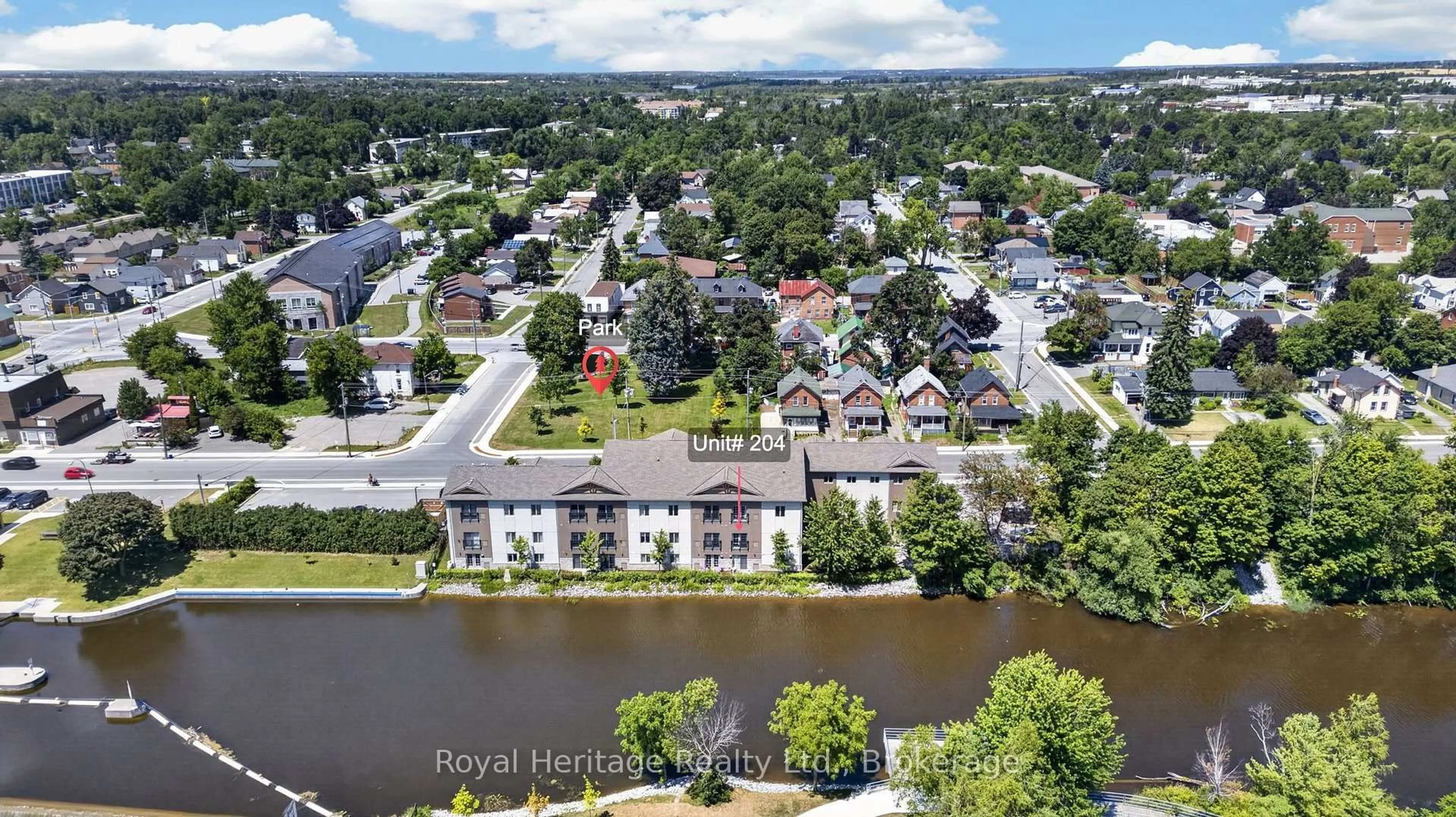 A pic from outside/outdoor area/front of a property/back of a property/a pic from drone, water/lake/river/ocean view for 25 King St #204, Kawartha Lakes Ontario K9V 1C4