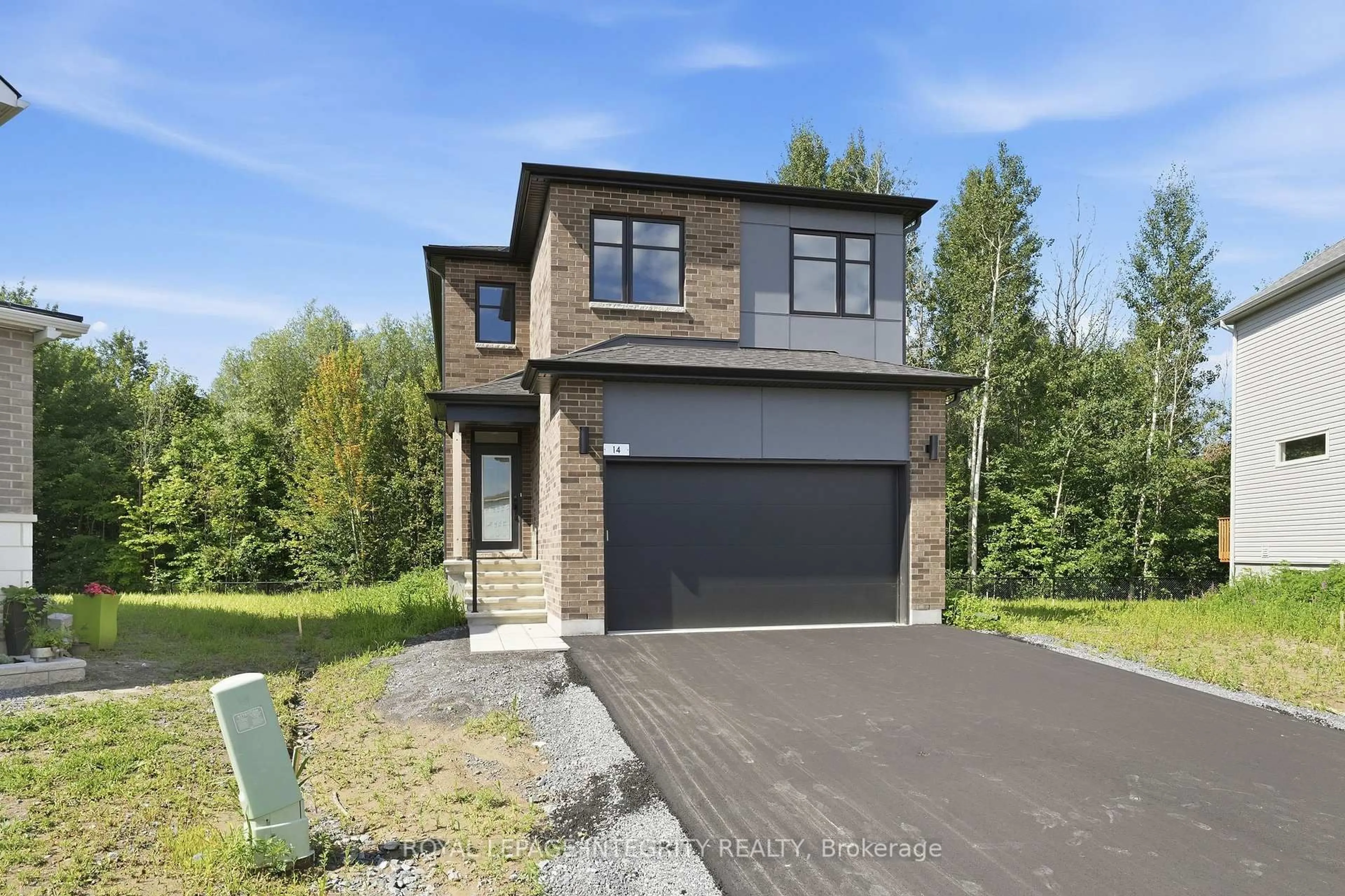 Home with brick exterior material, street for 14 Academie St, Russell Ontario K0A 1W0