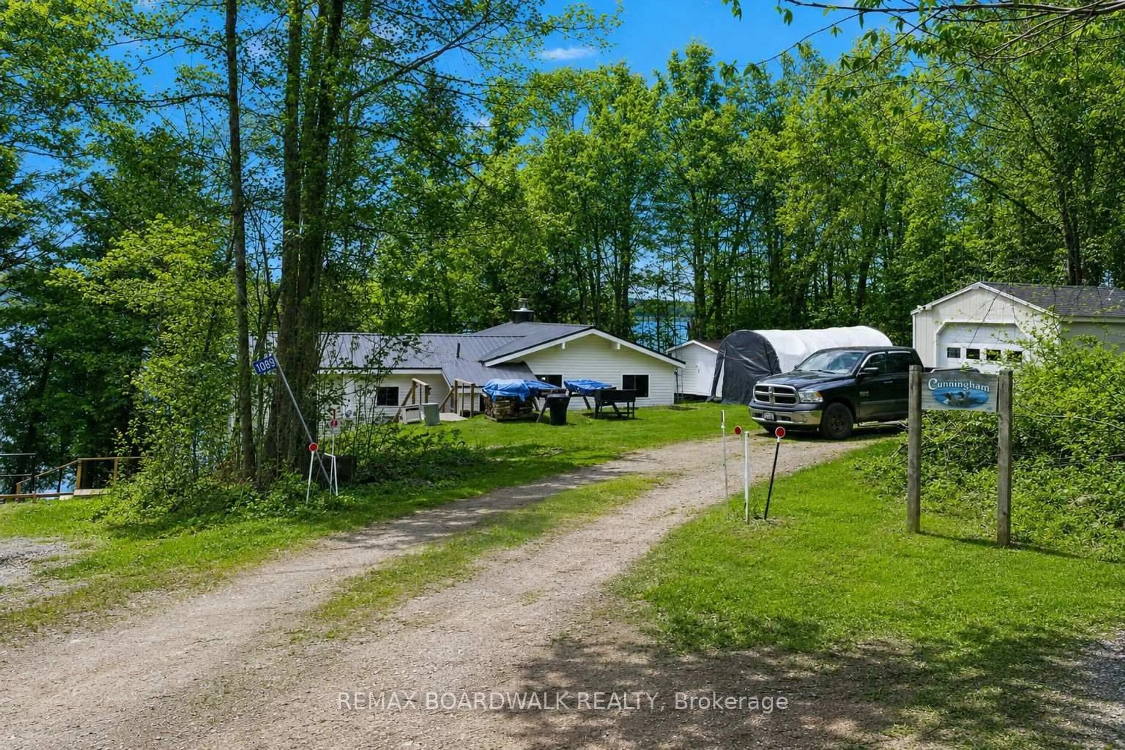 A pic from outside/outdoor area/front of a property/back of a property/a pic from drone, unknown for 1091 Big Clear Lane, Frontenac Ontario K0H 0B6
