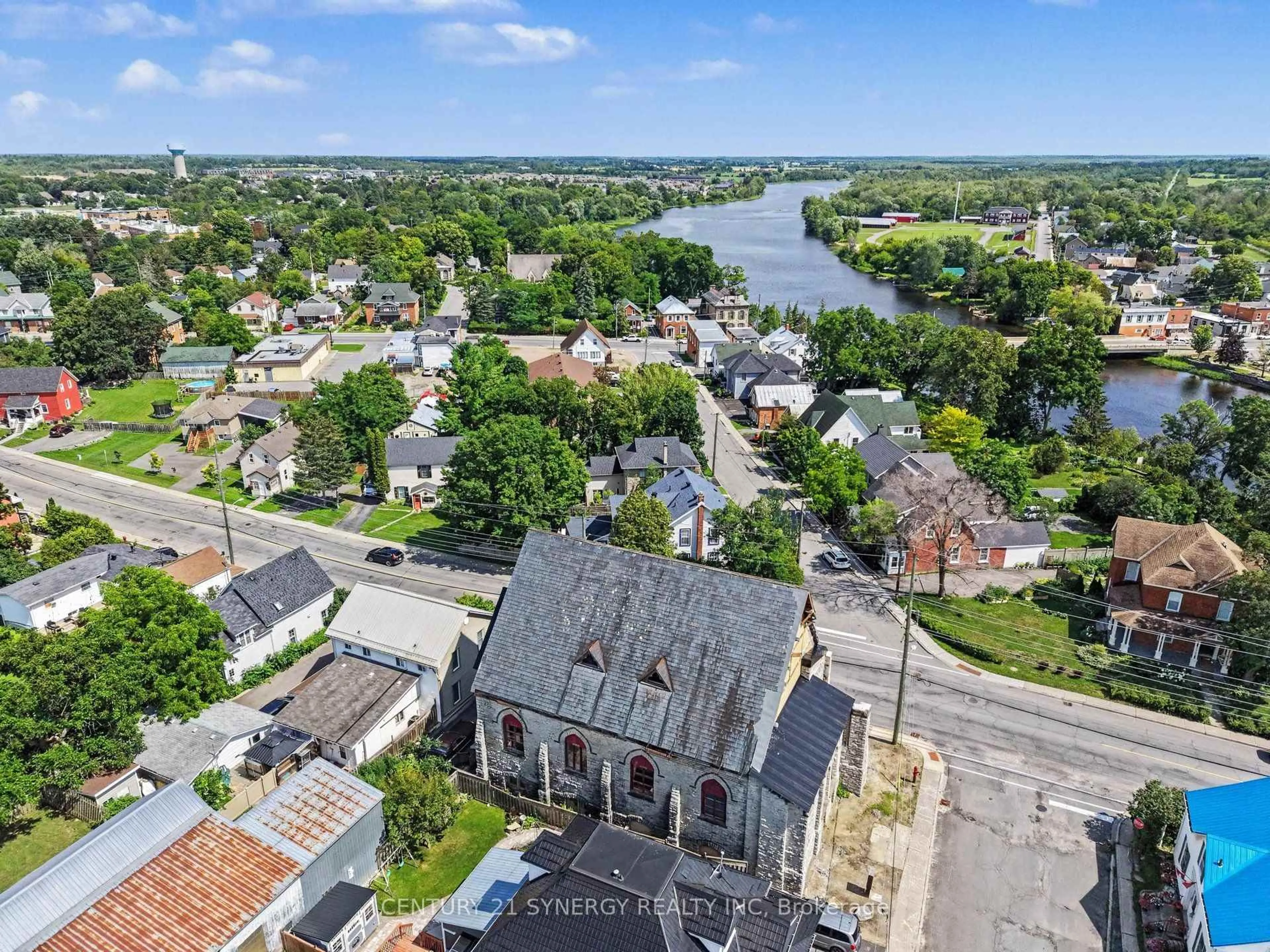 A pic from outside/outdoor area/front of a property/back of a property/a pic from drone, water/lake/river/ocean view for 38 Main St, Almonte Ontario K0A 1A0