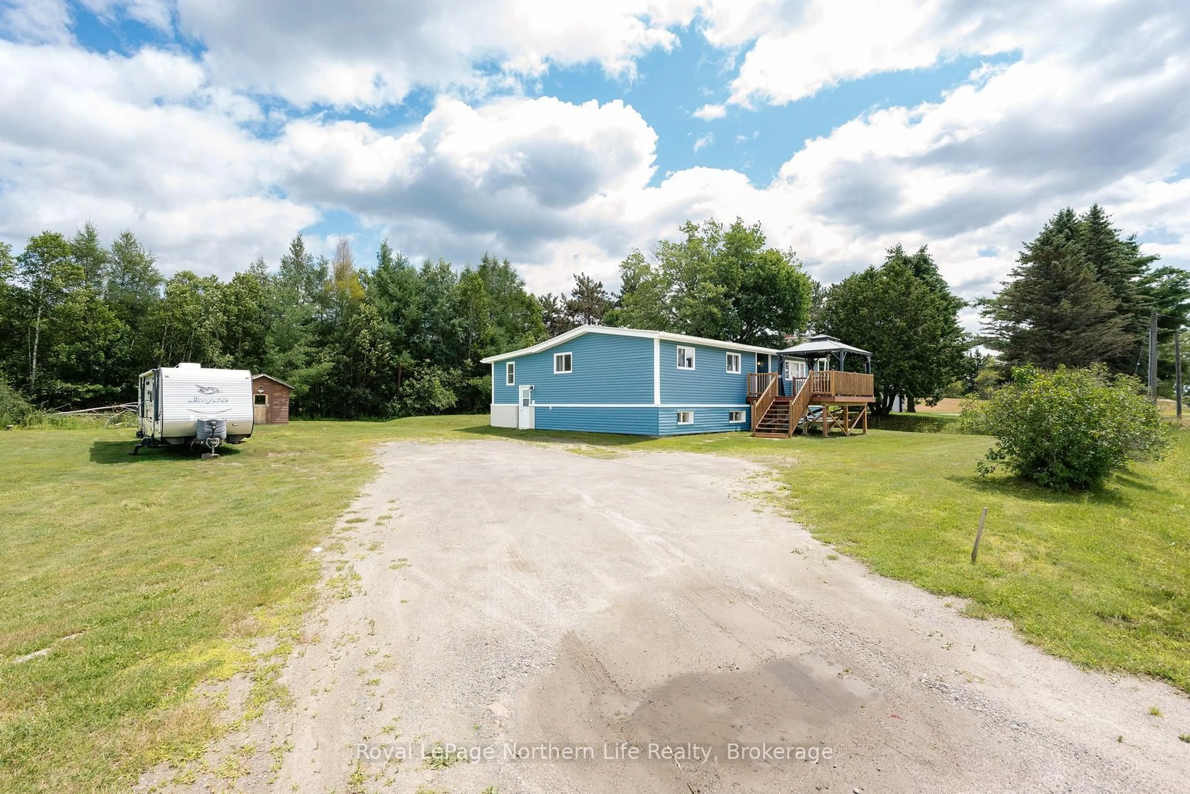 A pic from outside/outdoor area/front of a property/back of a property/a pic from drone, unknown for 558 Nipissing St, West Nipissing Ontario P2B 2L1