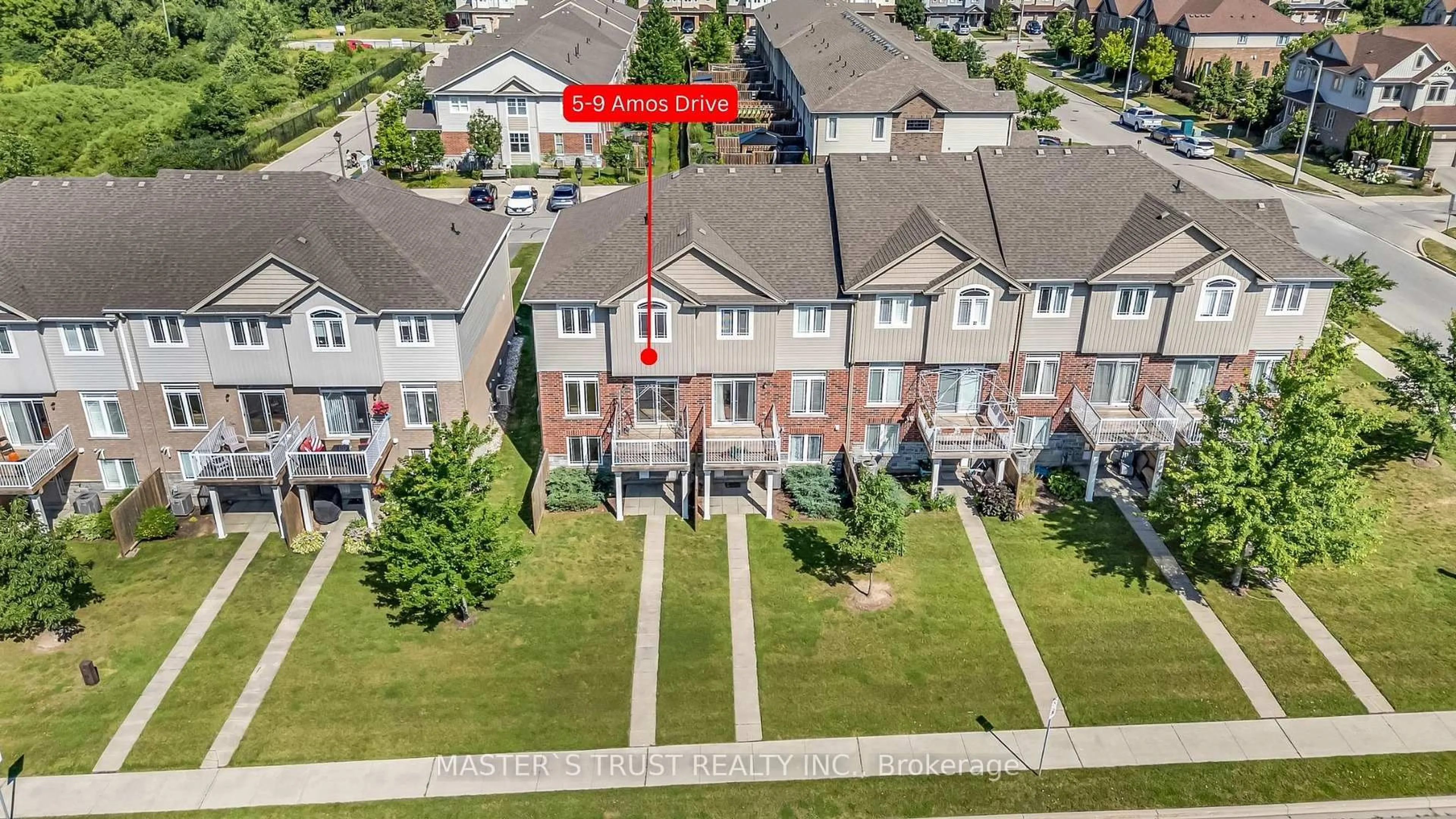 A pic from outside/outdoor area/front of a property/back of a property/a pic from drone, unknown for 9 Amos Dr #5, Guelph Ontario N1L 0M3
