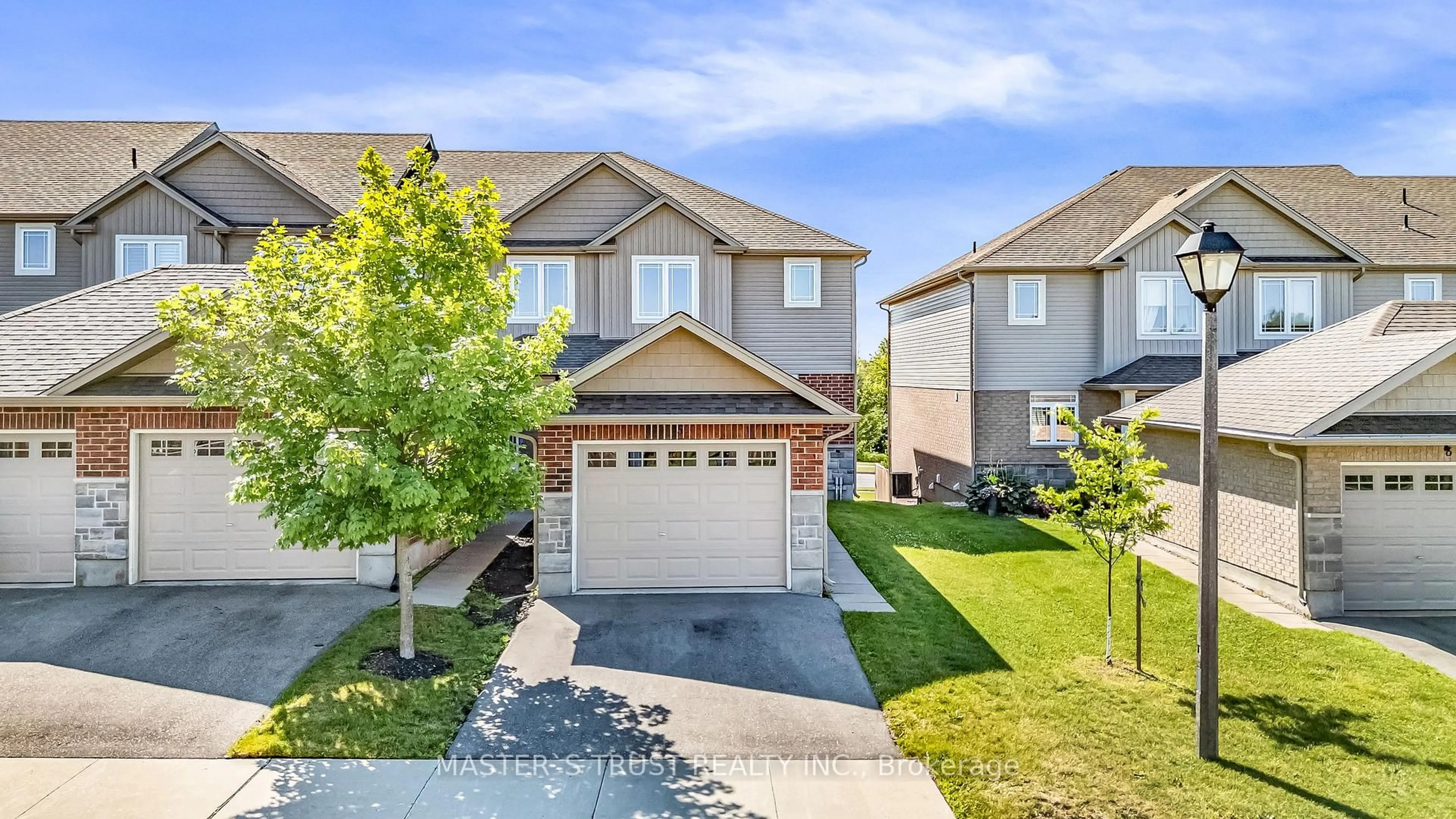 A pic from outside/outdoor area/front of a property/back of a property/a pic from drone, street for 9 Amos Dr #5, Guelph Ontario N1L 0M3