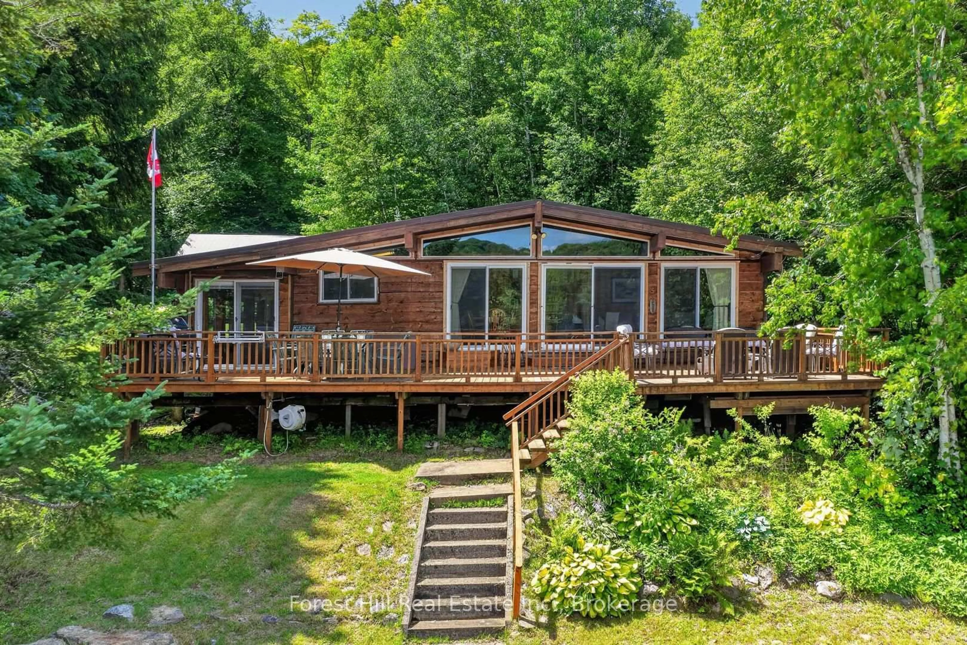 A pic from outside/outdoor area/front of a property/back of a property/a pic from drone, water/lake/river/ocean view for 1355 Bellwood Acres Rd, Lake of Bays Ontario P0A 1E0