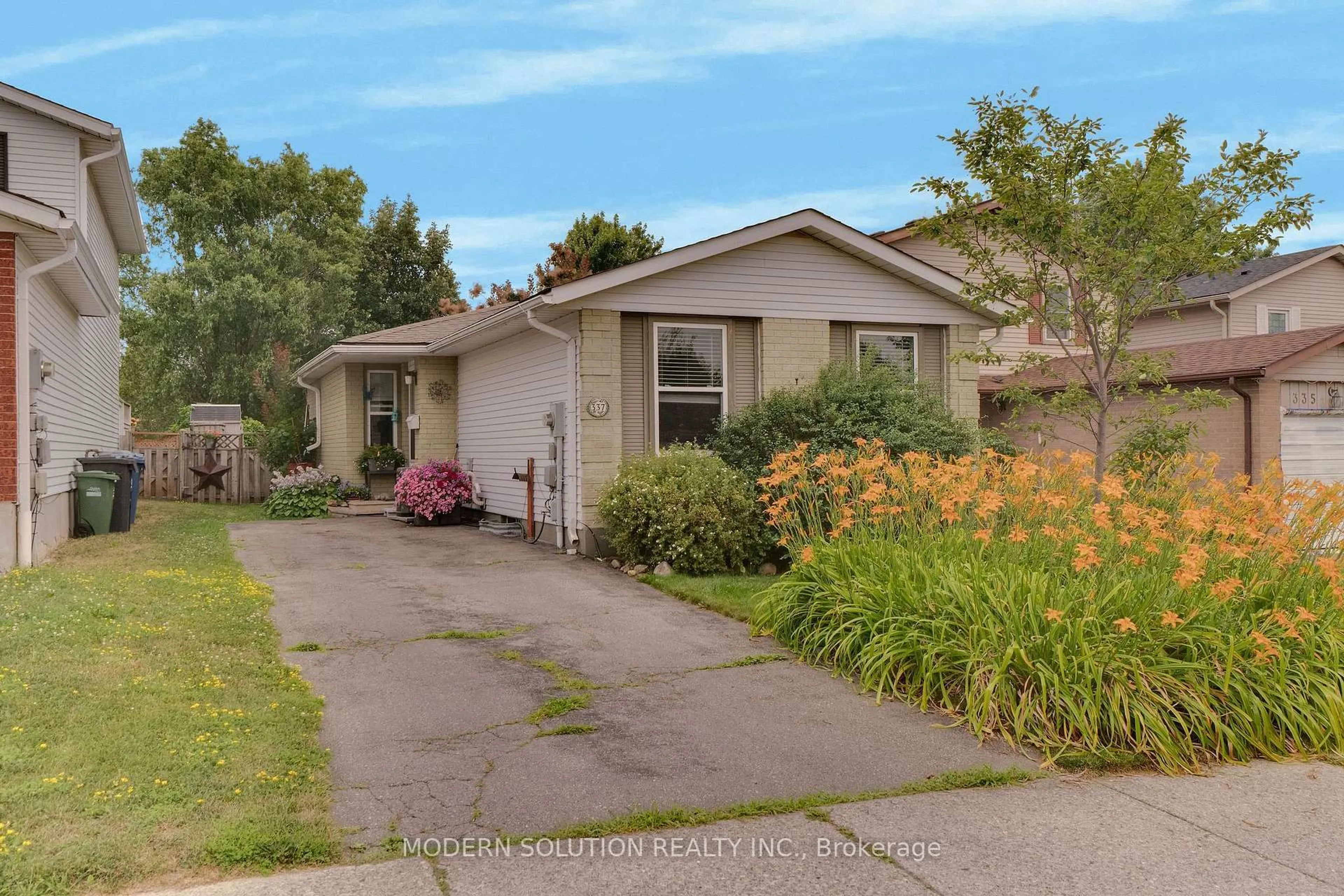 Home with vinyl exterior material, street for 337 Auden Rd, Guelph Ontario N1E 6T2