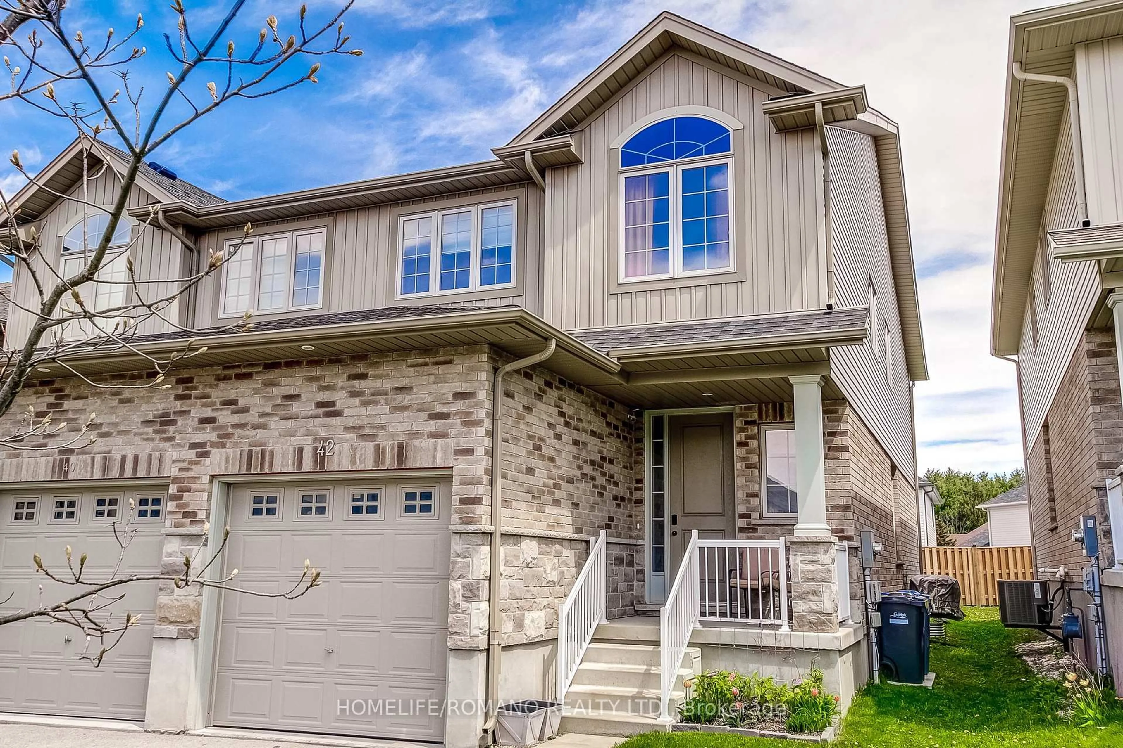 Home with vinyl exterior material, street for 42 Dallan Dr, Guelph Ontario N1L 0N1