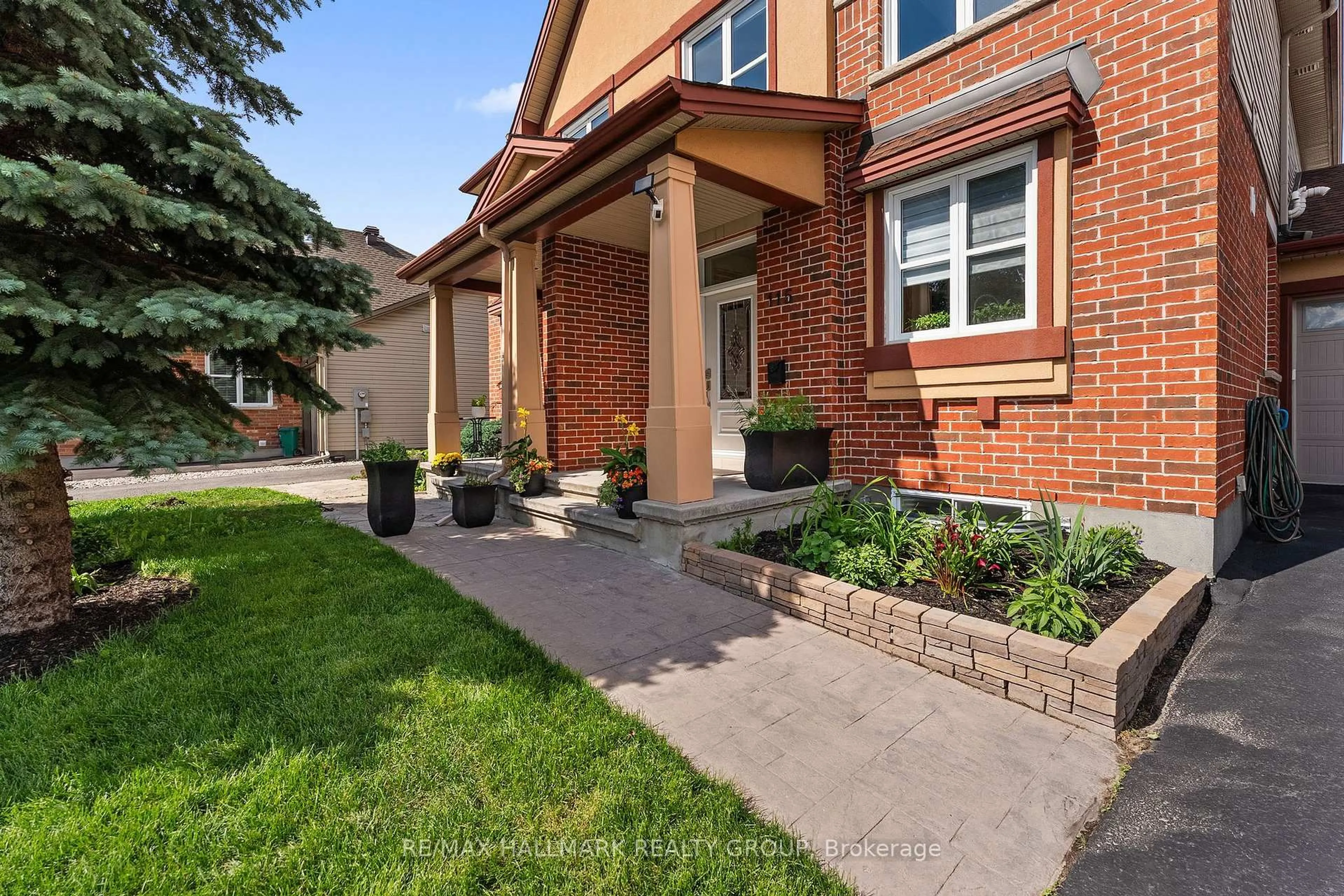 Home with brick exterior material, street for 115 Beatrice Dr, Ottawa Ontario K2J 5A4