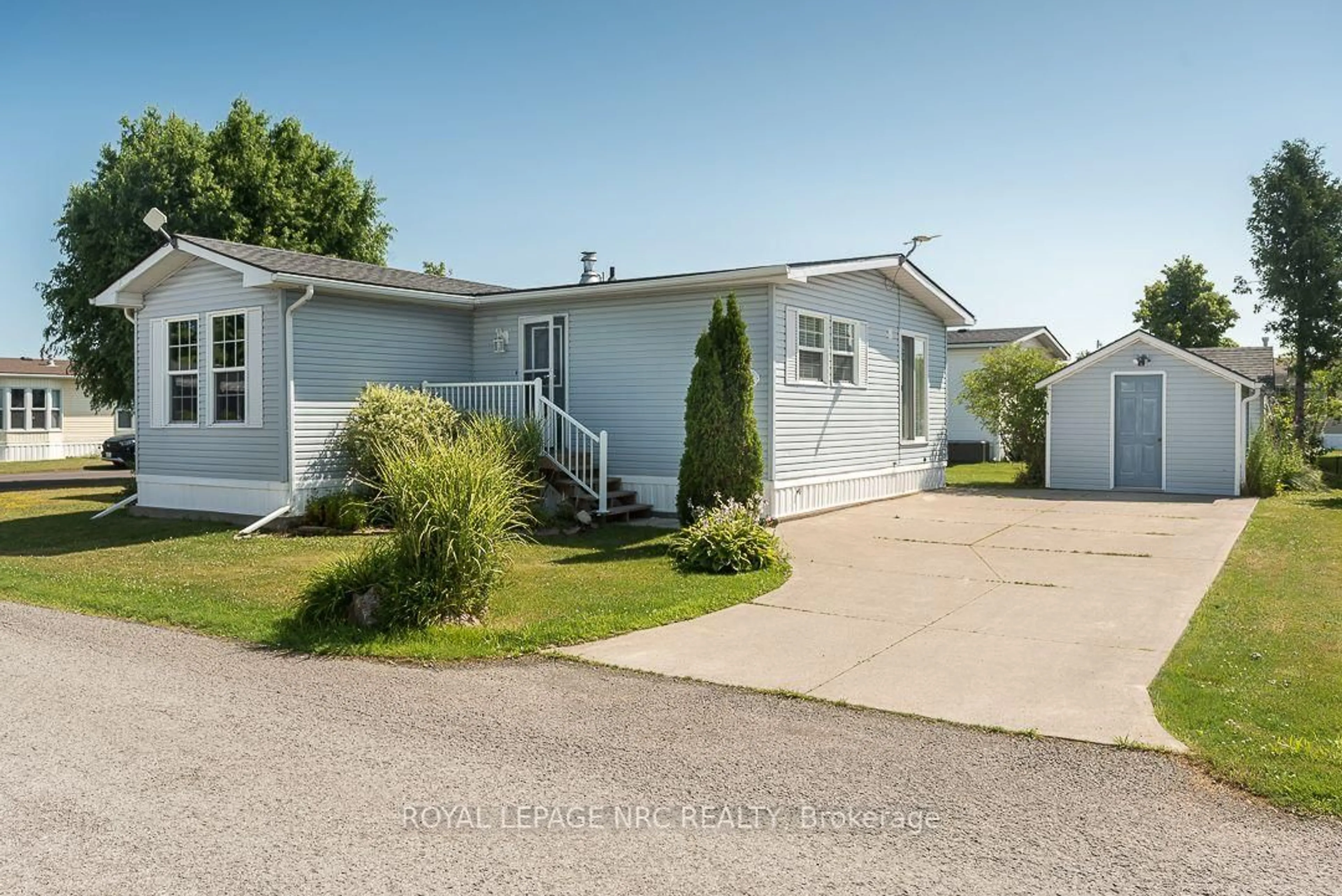 A pic from outside/outdoor area/front of a property/back of a property/a pic from drone, street for 3033 Townline Rd #264, Fort Erie Ontario L0S 1S1