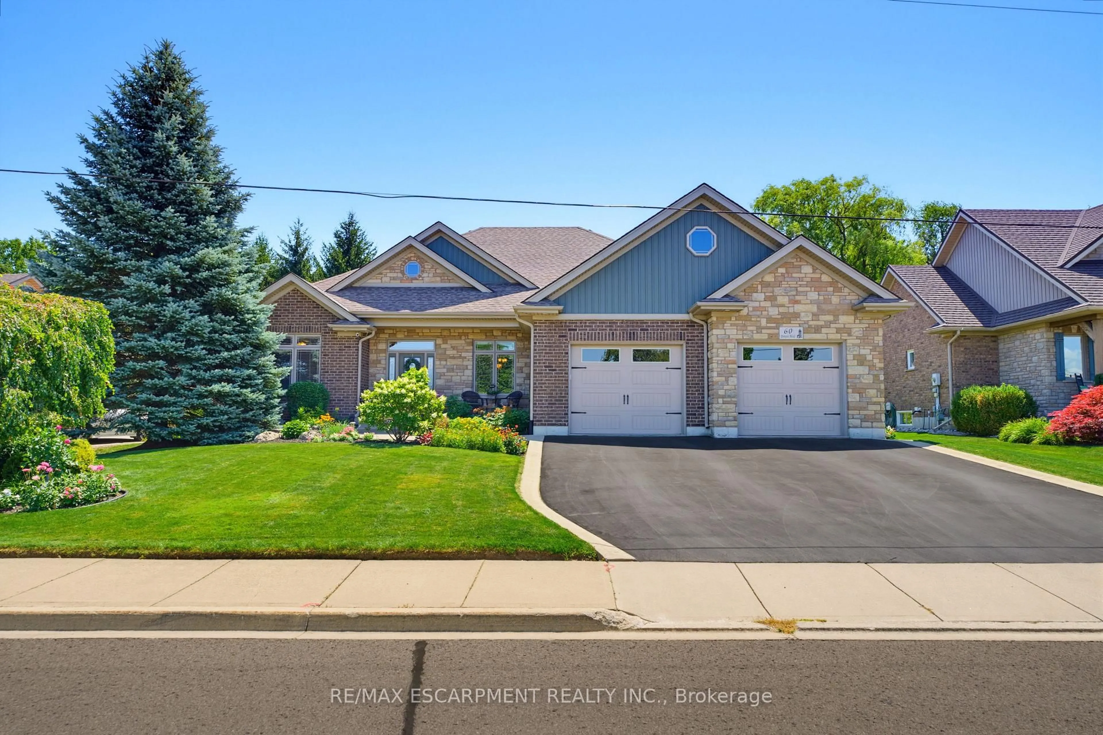 Home with brick exterior material, street for 60 Donjon Blvd, Norfolk Ontario N0A 1N7