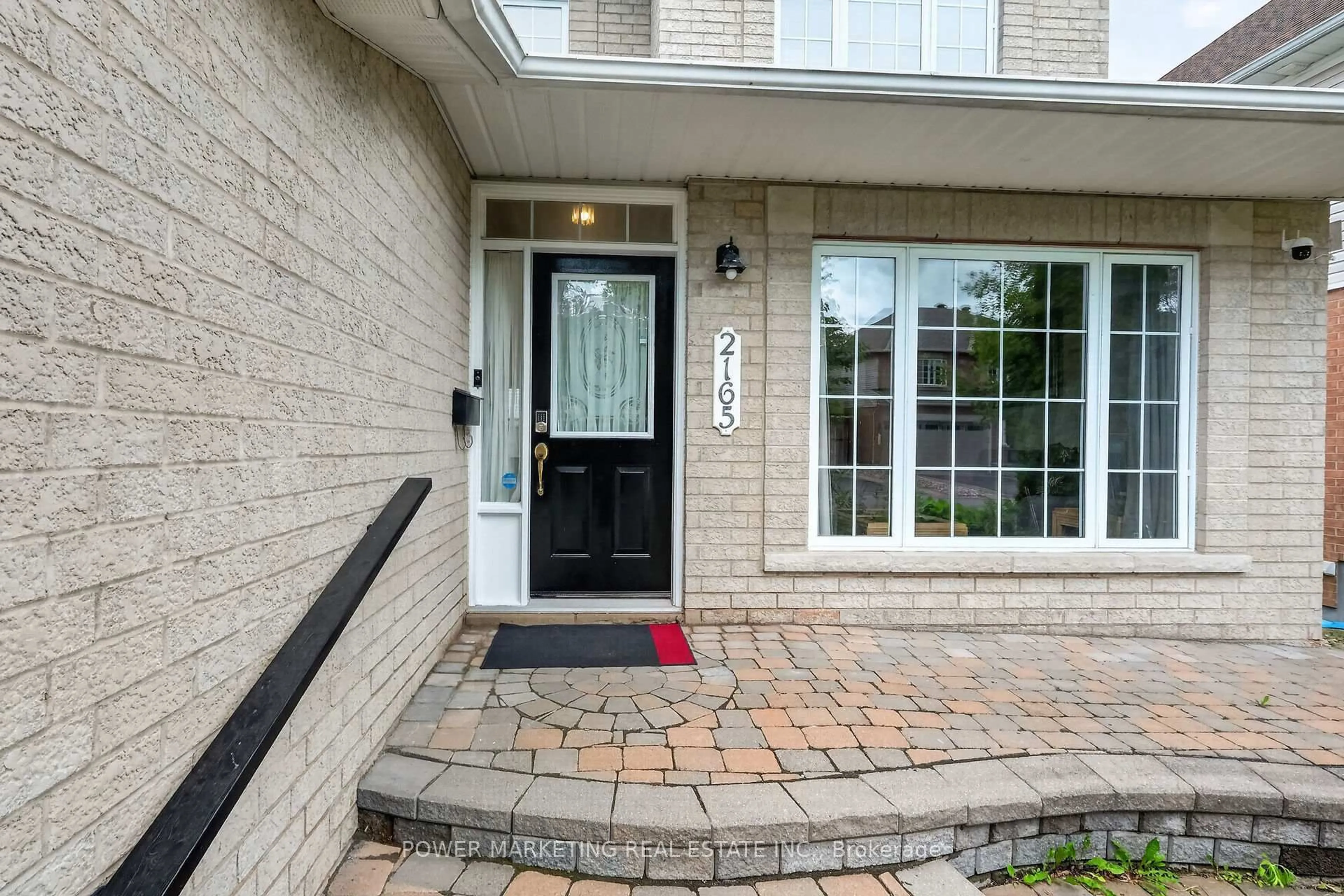Home with brick exterior material, street for 2165 BLUE WILLOW Cres, Orleans Ontario K1W 1K7