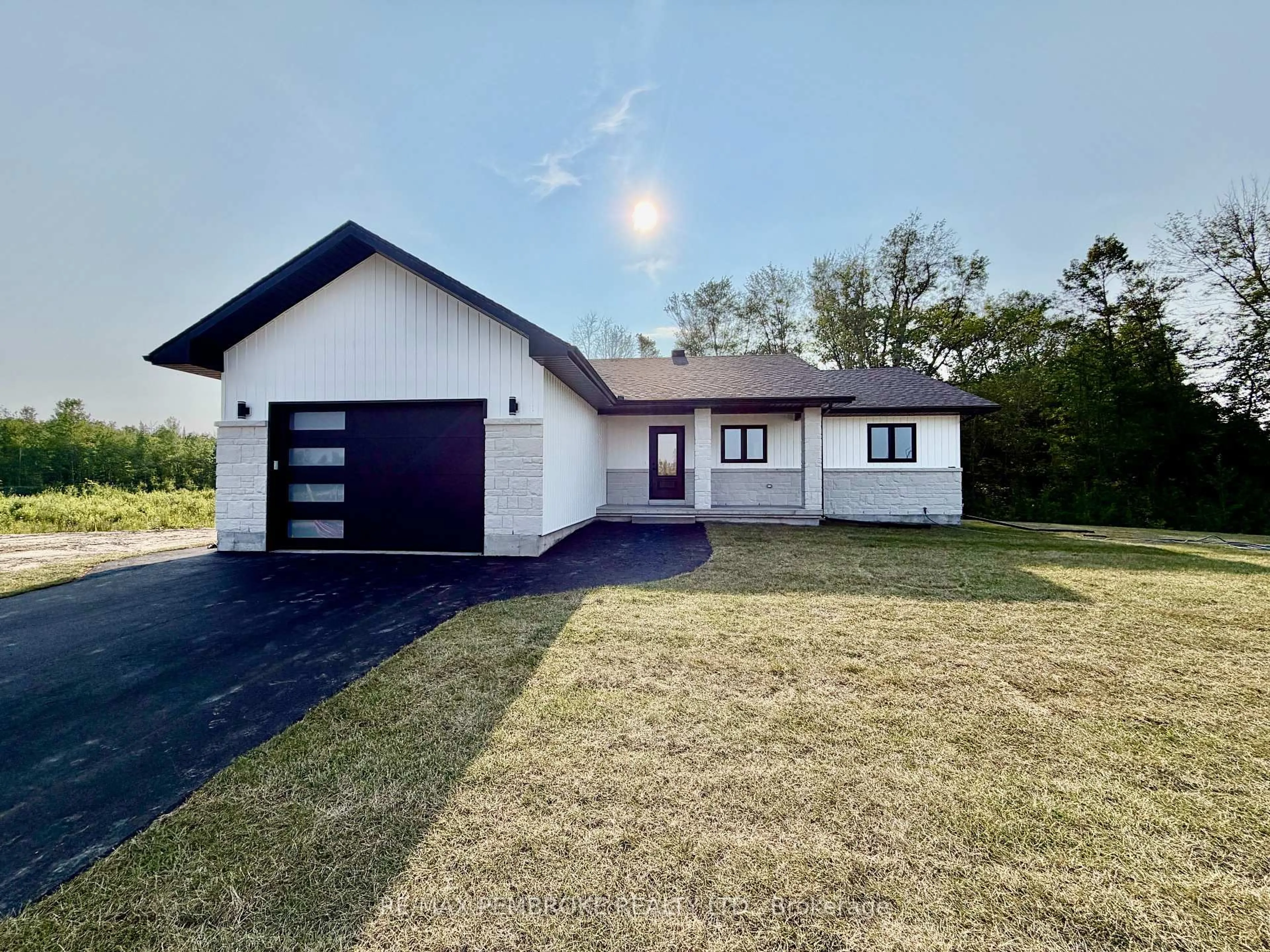 A pic from outside/outdoor area/front of a property/back of a property/a pic from drone, unknown for 55 Eddy Cres, Pembroke Ontario K8A 0M1