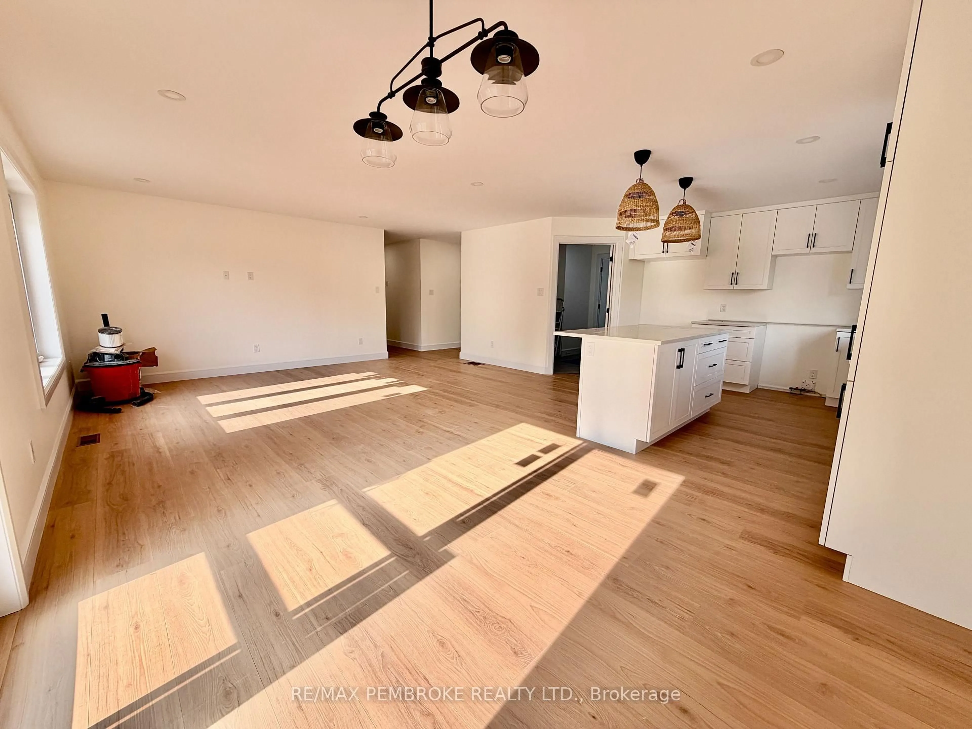 Open concept kitchen, wood/laminate floor for 55 Eddy Cres, Pembroke Ontario K8A 0M1