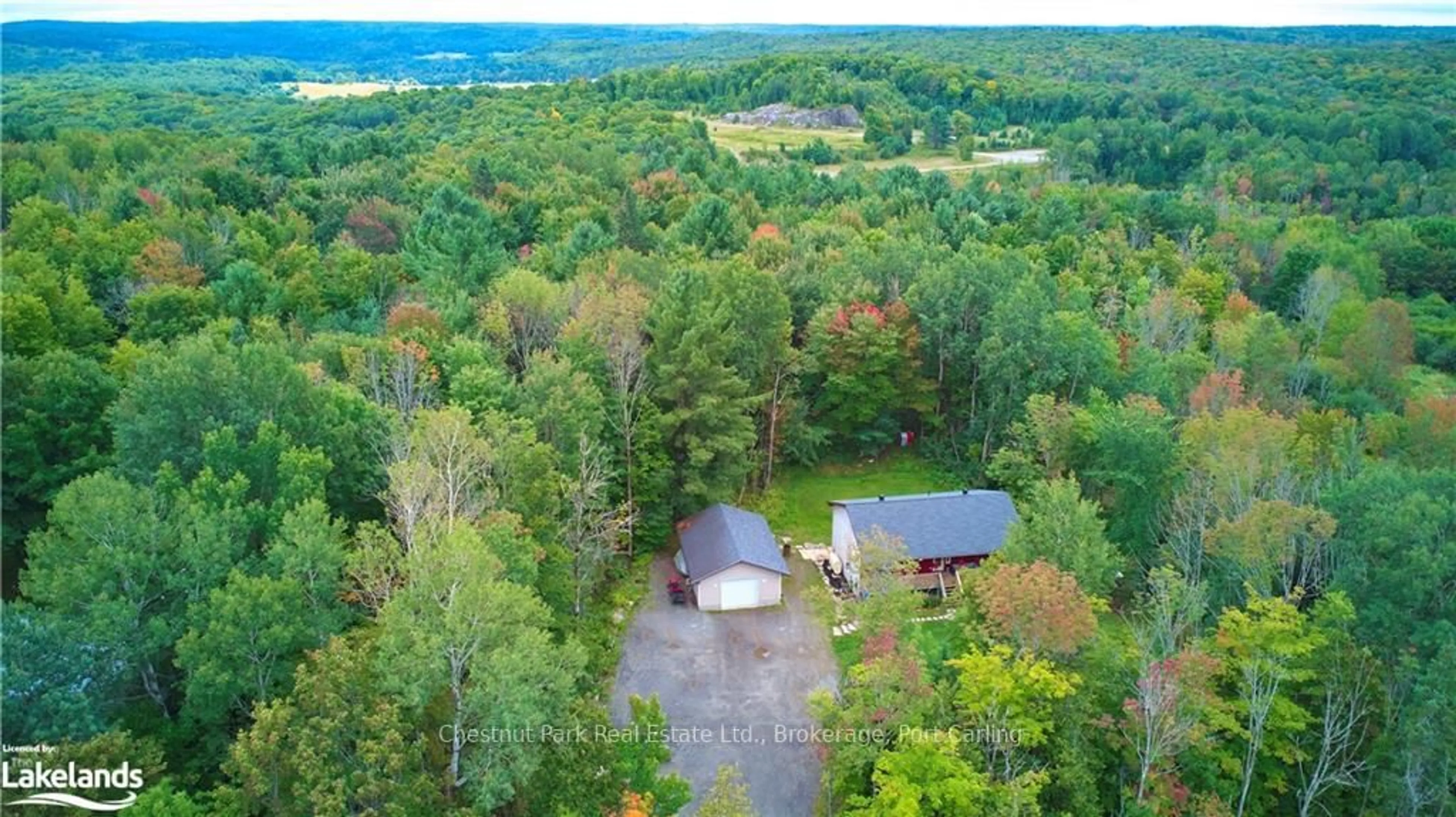 A pic from outside/outdoor area/front of a property/back of a property/a pic from drone, forest/trees view for 295 TOWN LINE Rd, Huntsville Ontario P1H 1T8