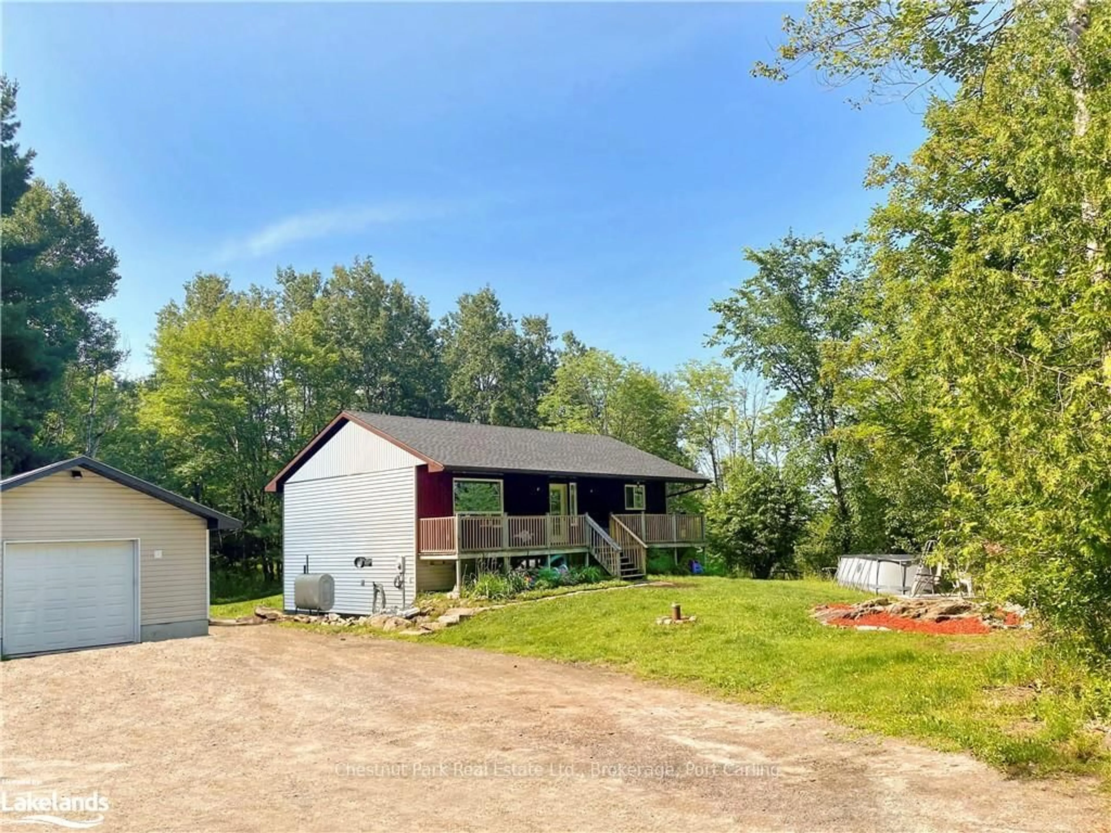 A pic from outside/outdoor area/front of a property/back of a property/a pic from drone, unknown for 295 TOWN LINE Rd, Huntsville Ontario P1H 1T8