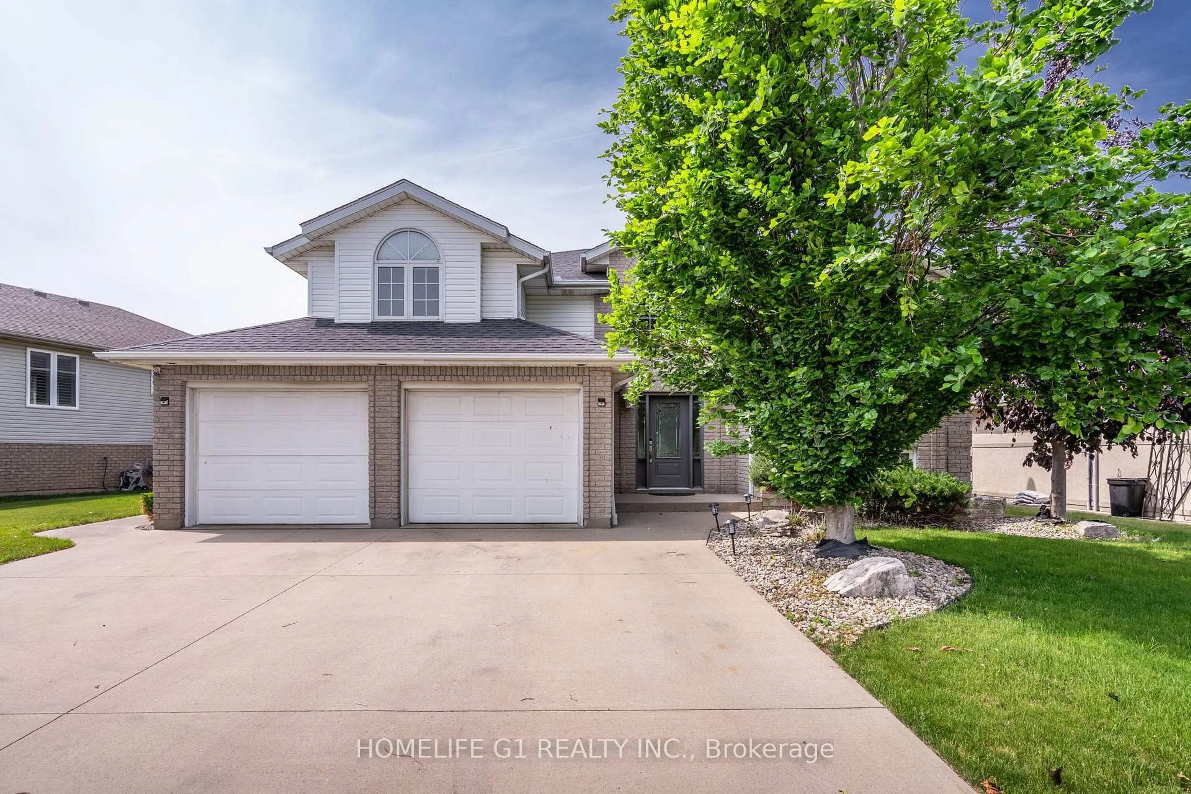 A pic from outside/outdoor area/front of a property/back of a property/a pic from drone, street for 165 Ellison Ave, Leamington Ontario N8H 5H9