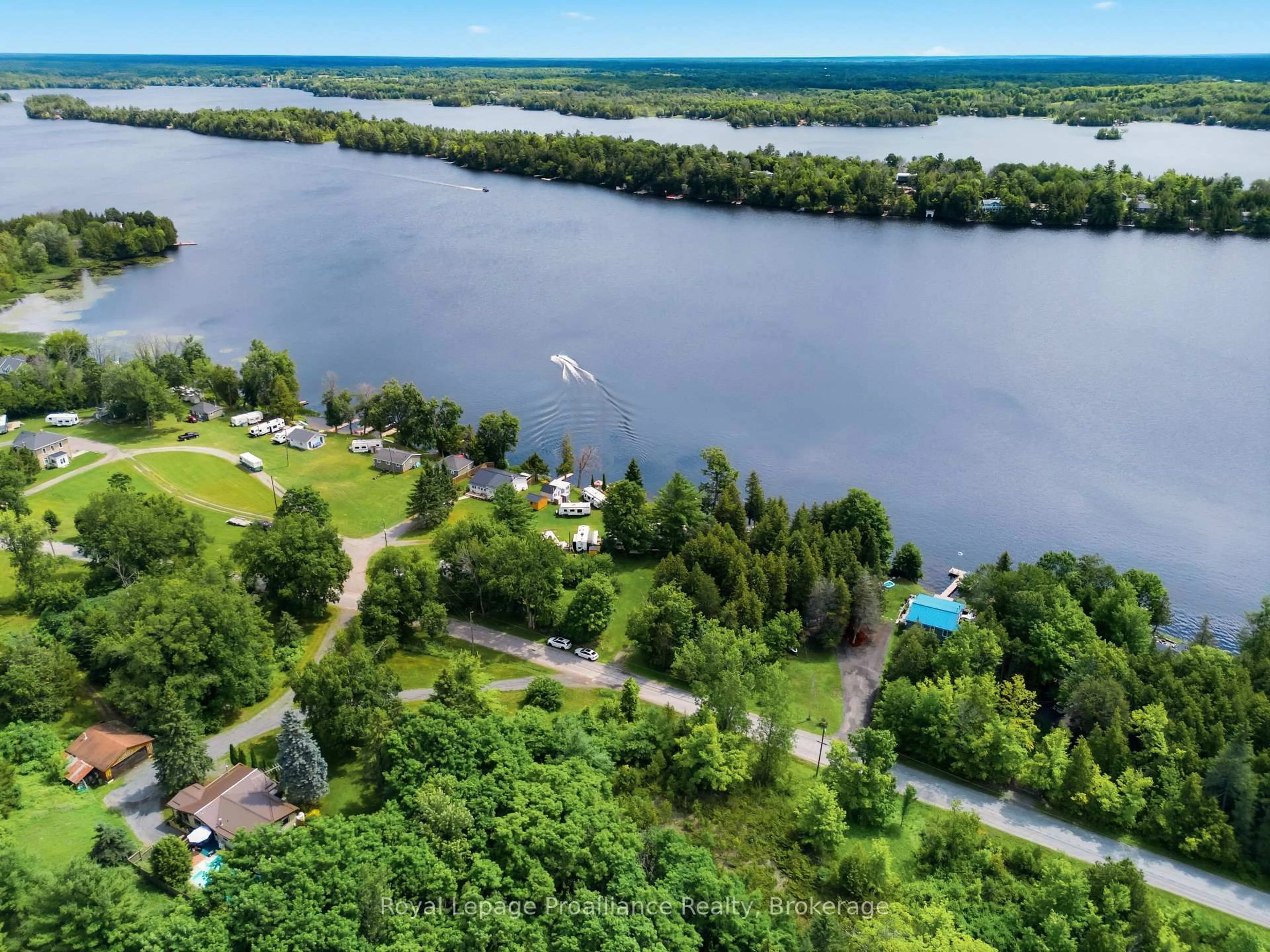 A pic from outside/outdoor area/front of a property/back of a property/a pic from drone, water/lake/river/ocean view for 188 North Beaver Lake Rd, Tamworth Ontario K0K 3G0