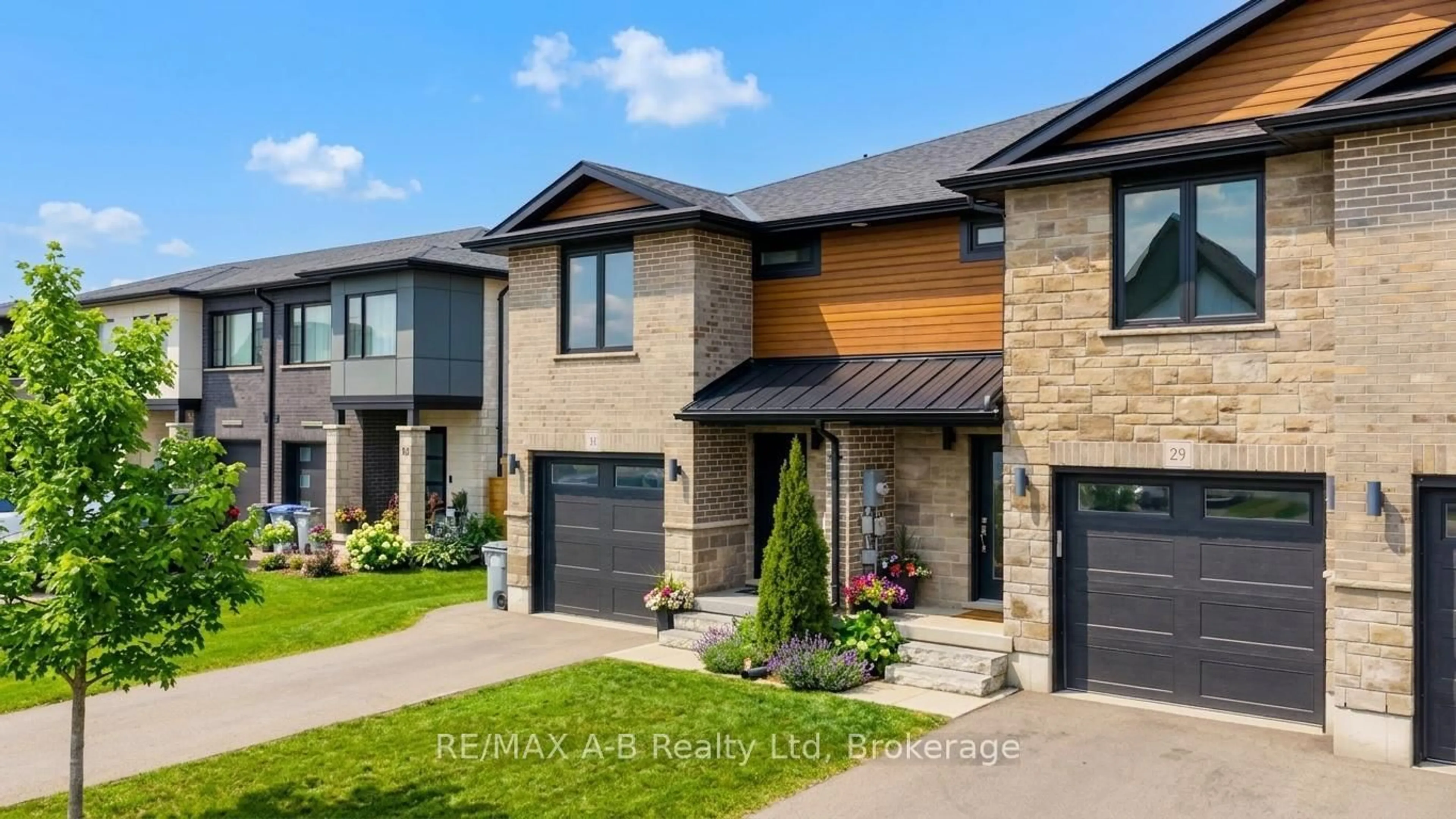 Home with brick exterior material, street for 31 Trailside Dr, St. Marys Ontario N4X 0C1