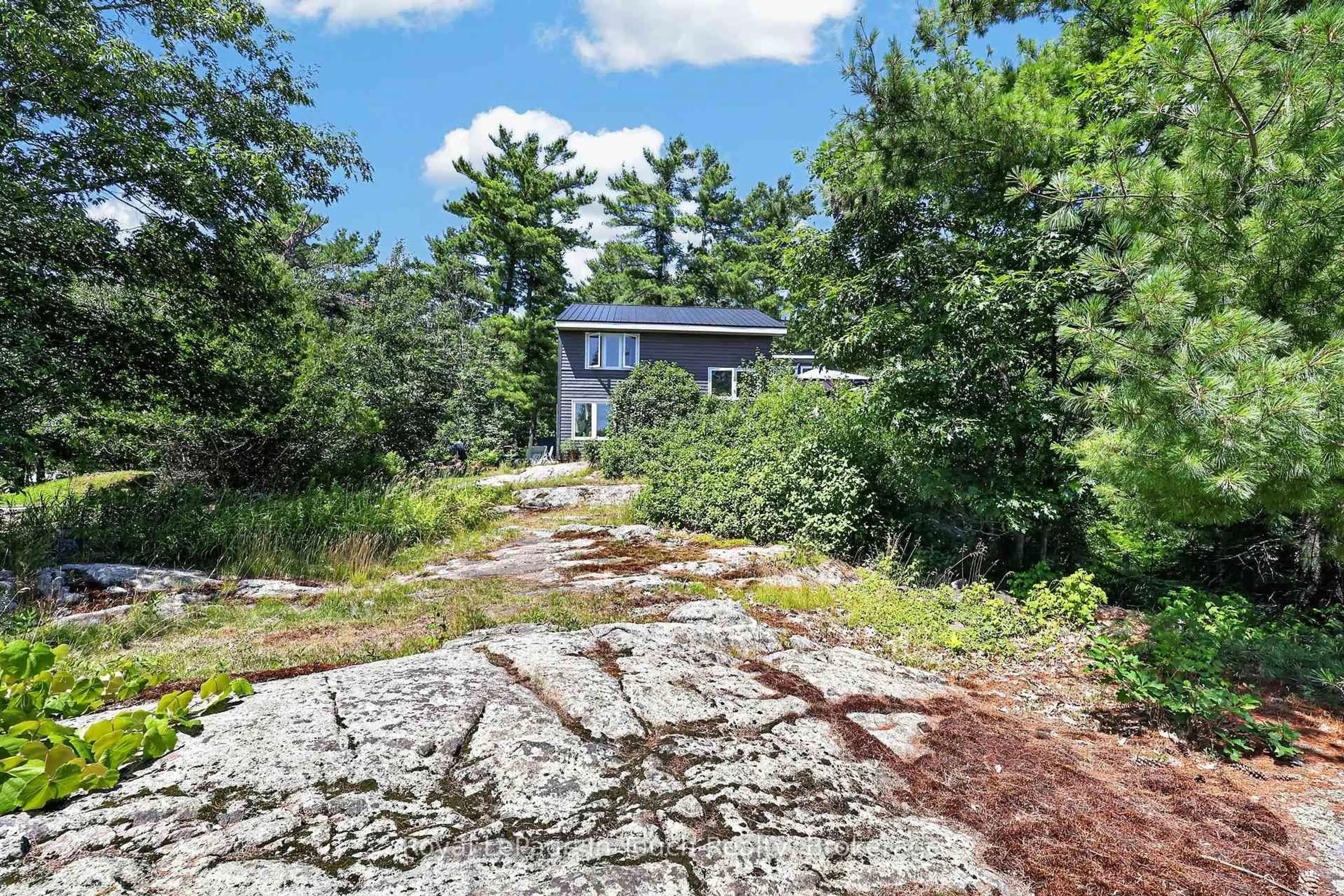 A pic from outside/outdoor area/front of a property/back of a property/a pic from drone, unknown for B207 lot  31 Island Island, The Archipelago Ontario P2A 2Z1