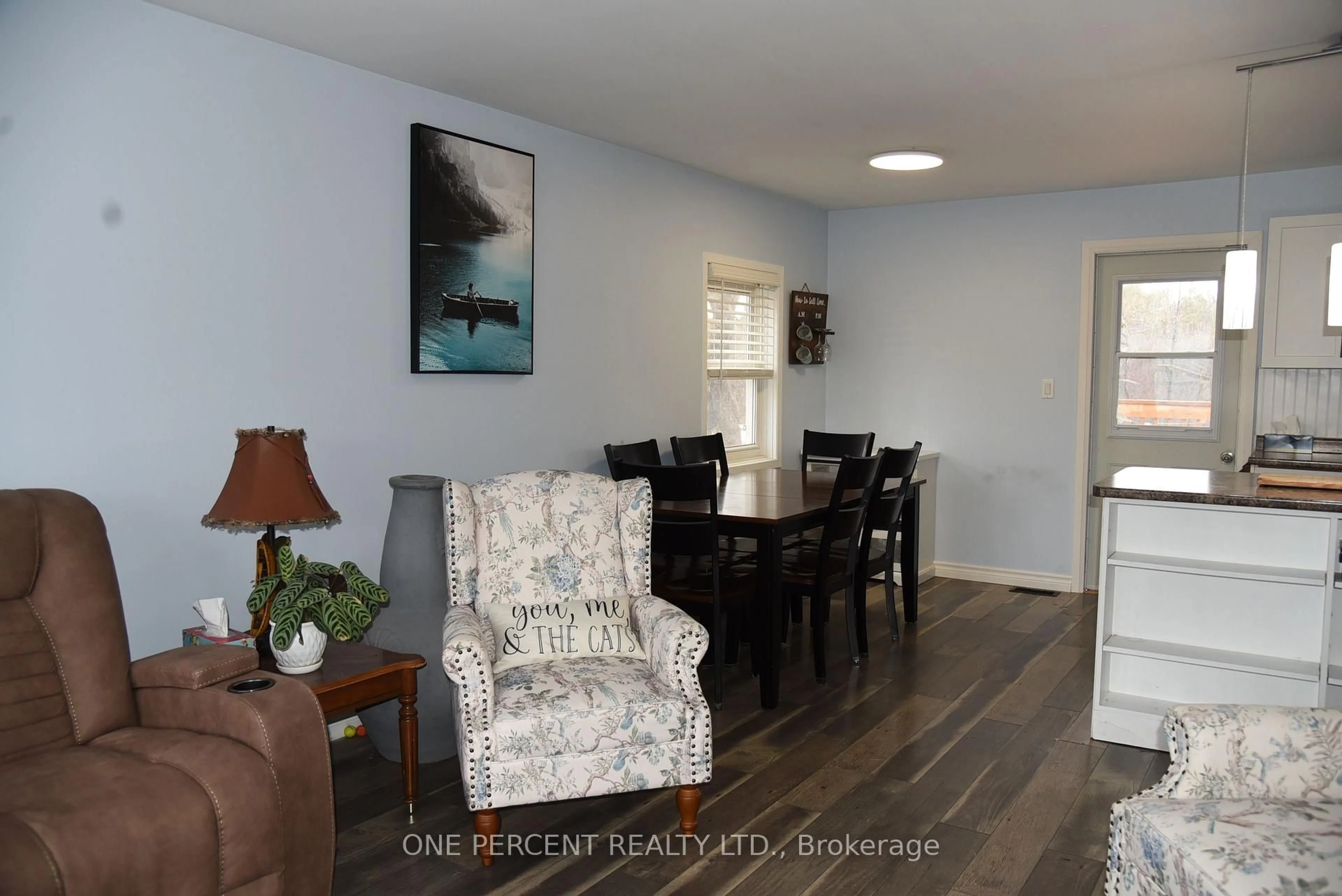 Living room with furniture, wood/laminate floor for 31 Prince St, Minden Hills Ontario K0M 2K0
