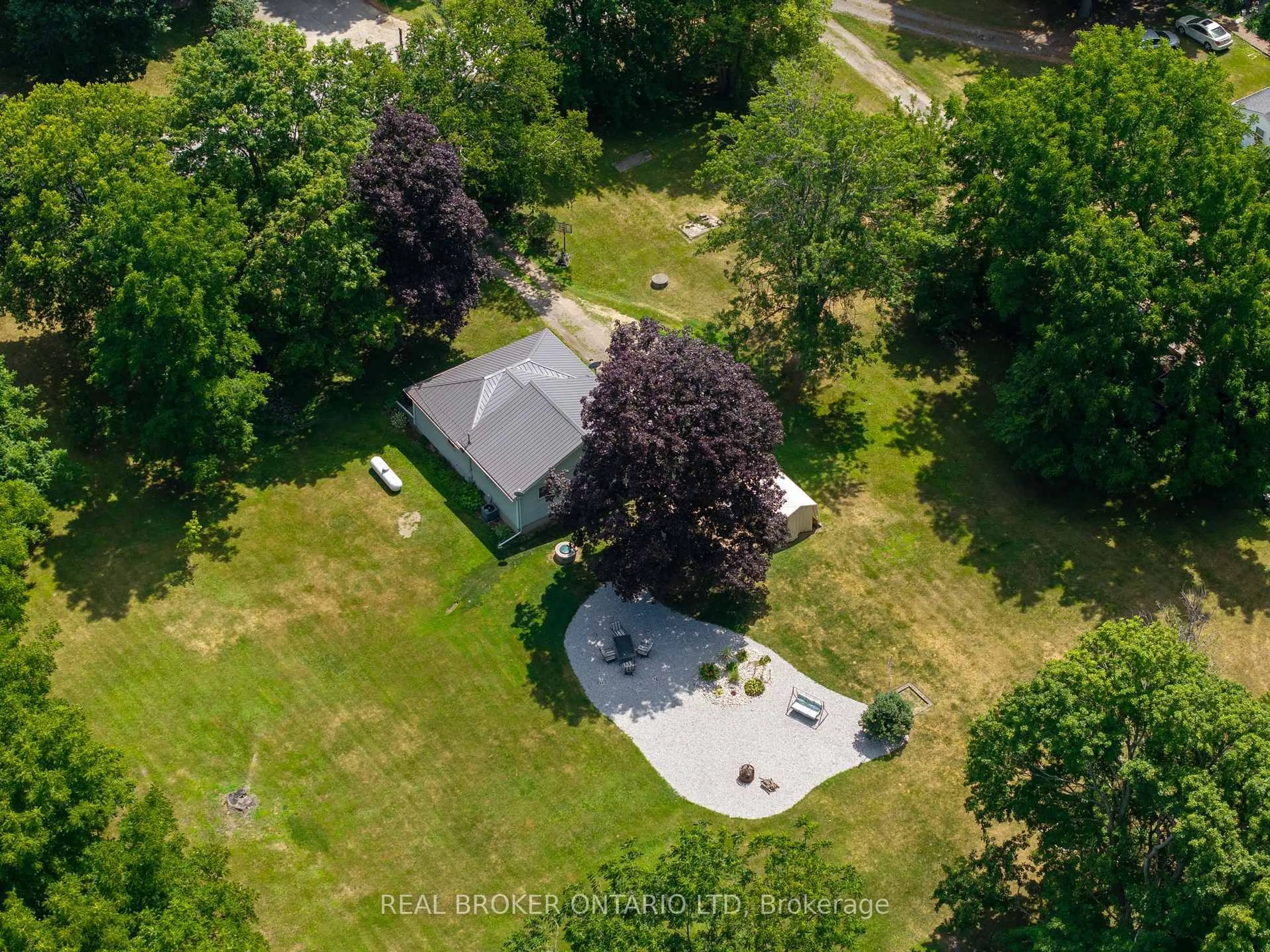 A pic from outside/outdoor area/front of a property/back of a property/a pic from drone, unknown for 15 Middlemiss Ave, Southwest Middlesex Ontario N0L 1T0