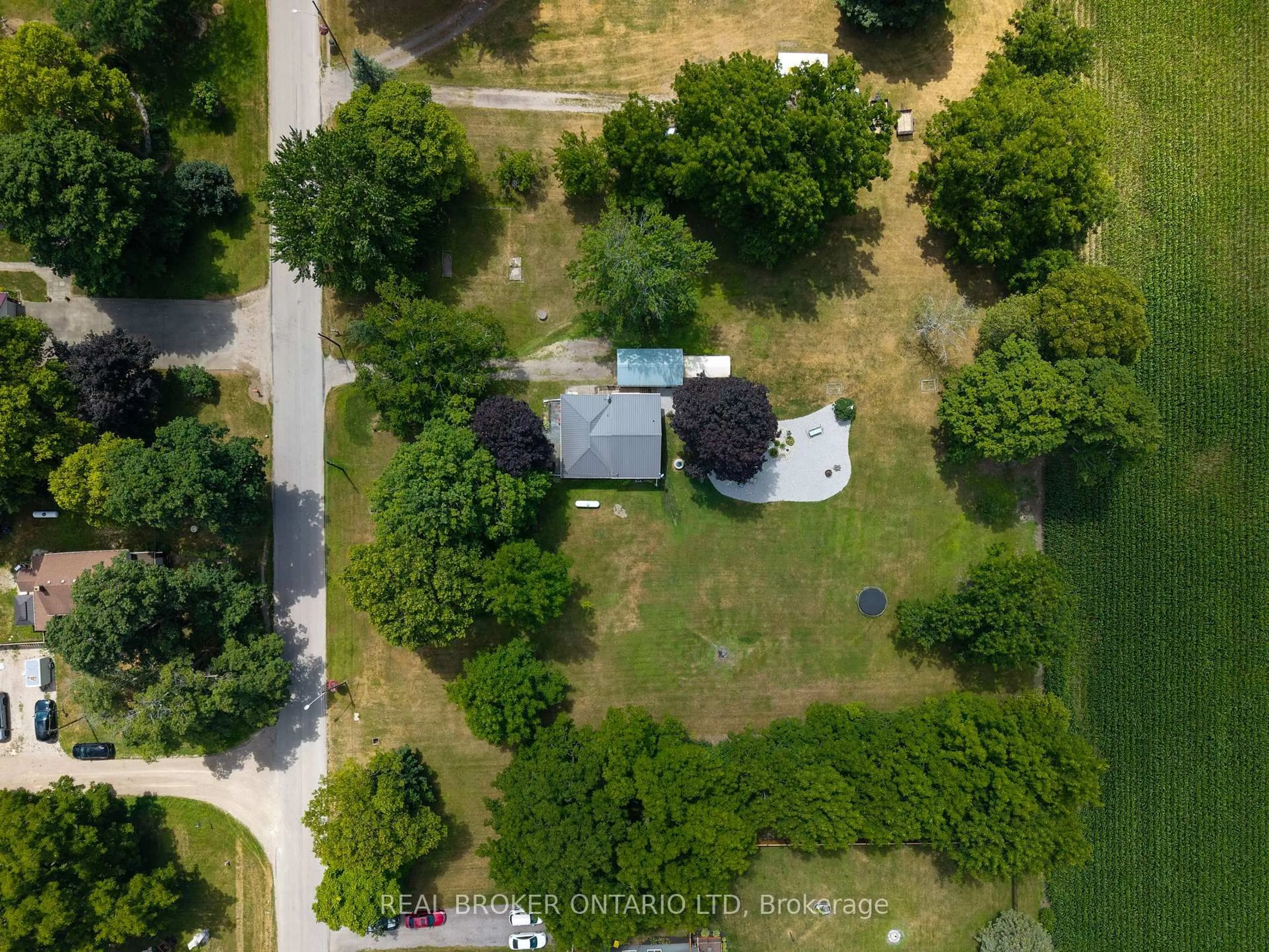 A pic from outside/outdoor area/front of a property/back of a property/a pic from drone, street for 15 Middlemiss Ave, Southwest Middlesex Ontario N0L 1T0