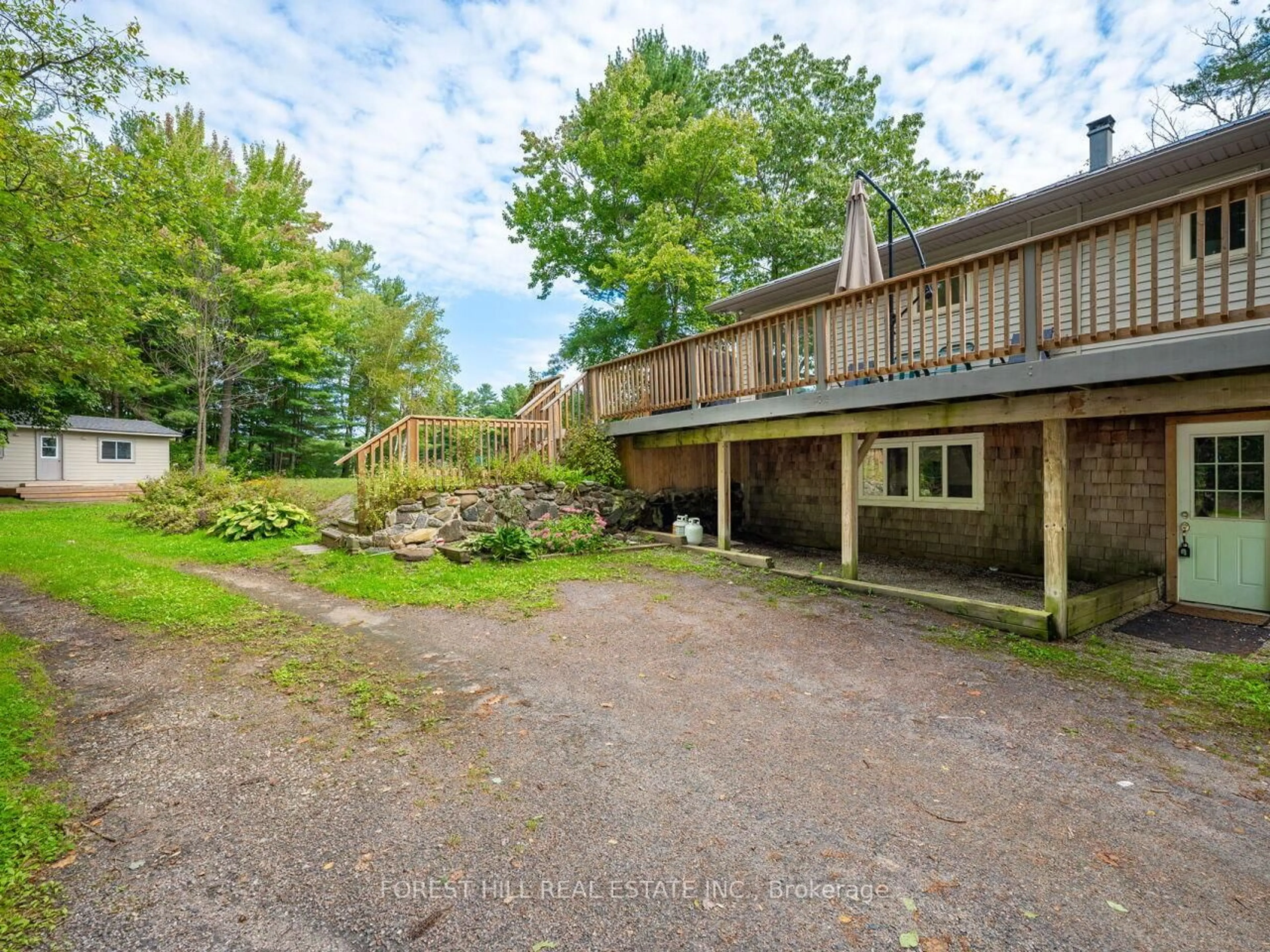 A pic from outside/outdoor area/front of a property/back of a property/a pic from drone, forest/trees view for 1006 Youngs Rd ##8, Muskoka Lakes Ontario P0B 1J0