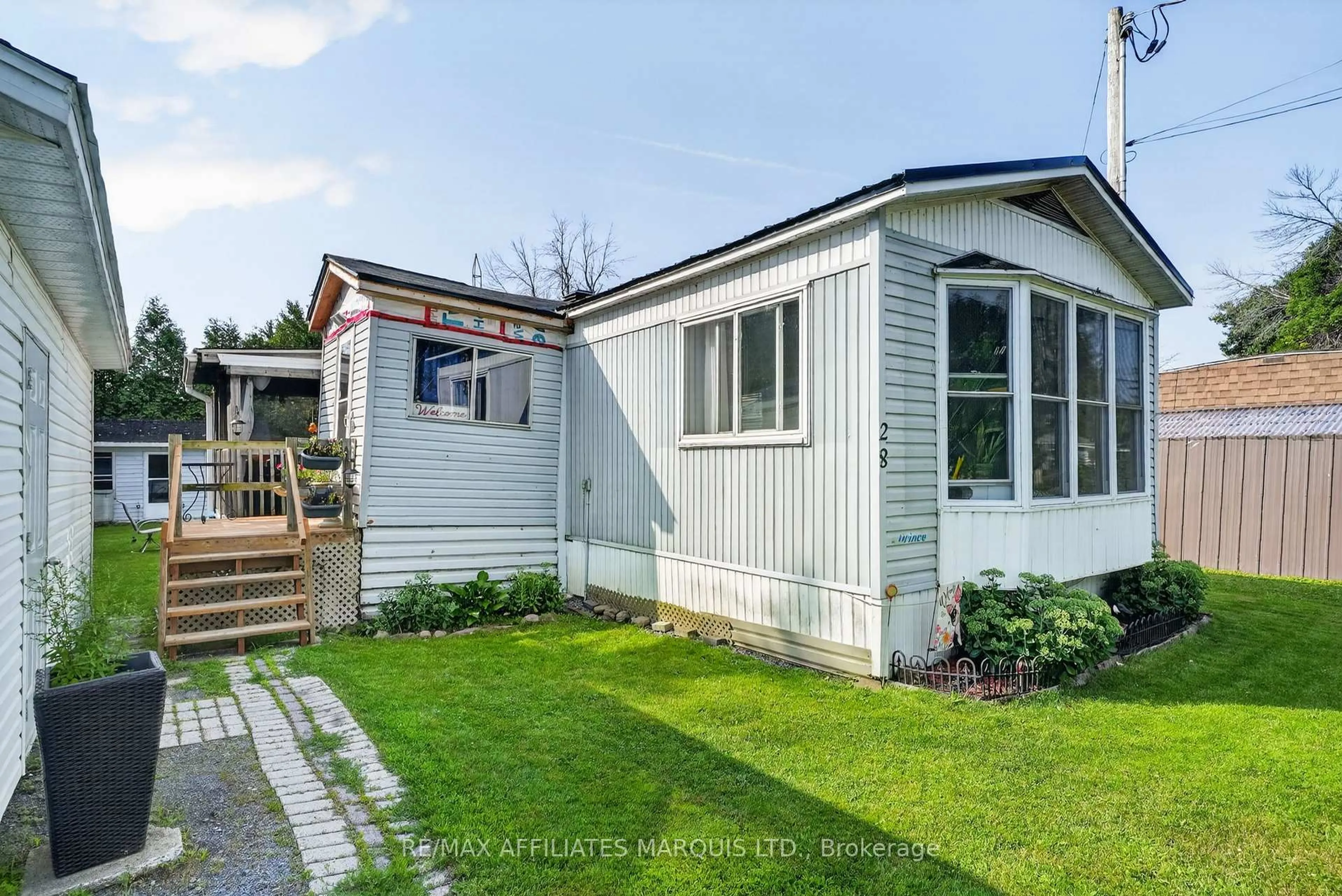 Home with vinyl exterior material, street for 28 Thomas St, South Glengarry Ontario K0C 1N0