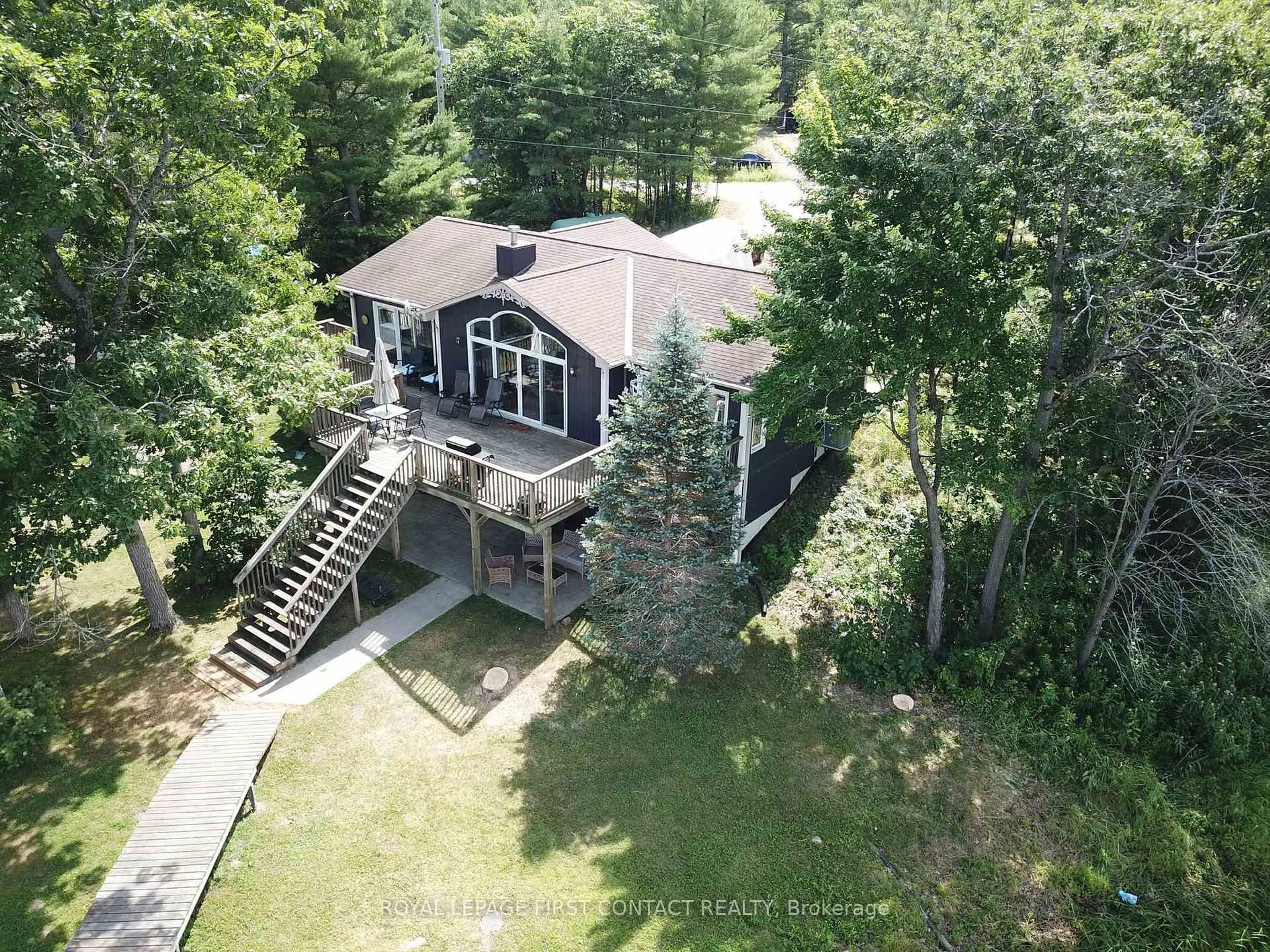 A pic from outside/outdoor area/front of a property/back of a property/a pic from drone, forest/trees view for 190 South Shore Rd, The Archipelago Ontario P0G 1K0
