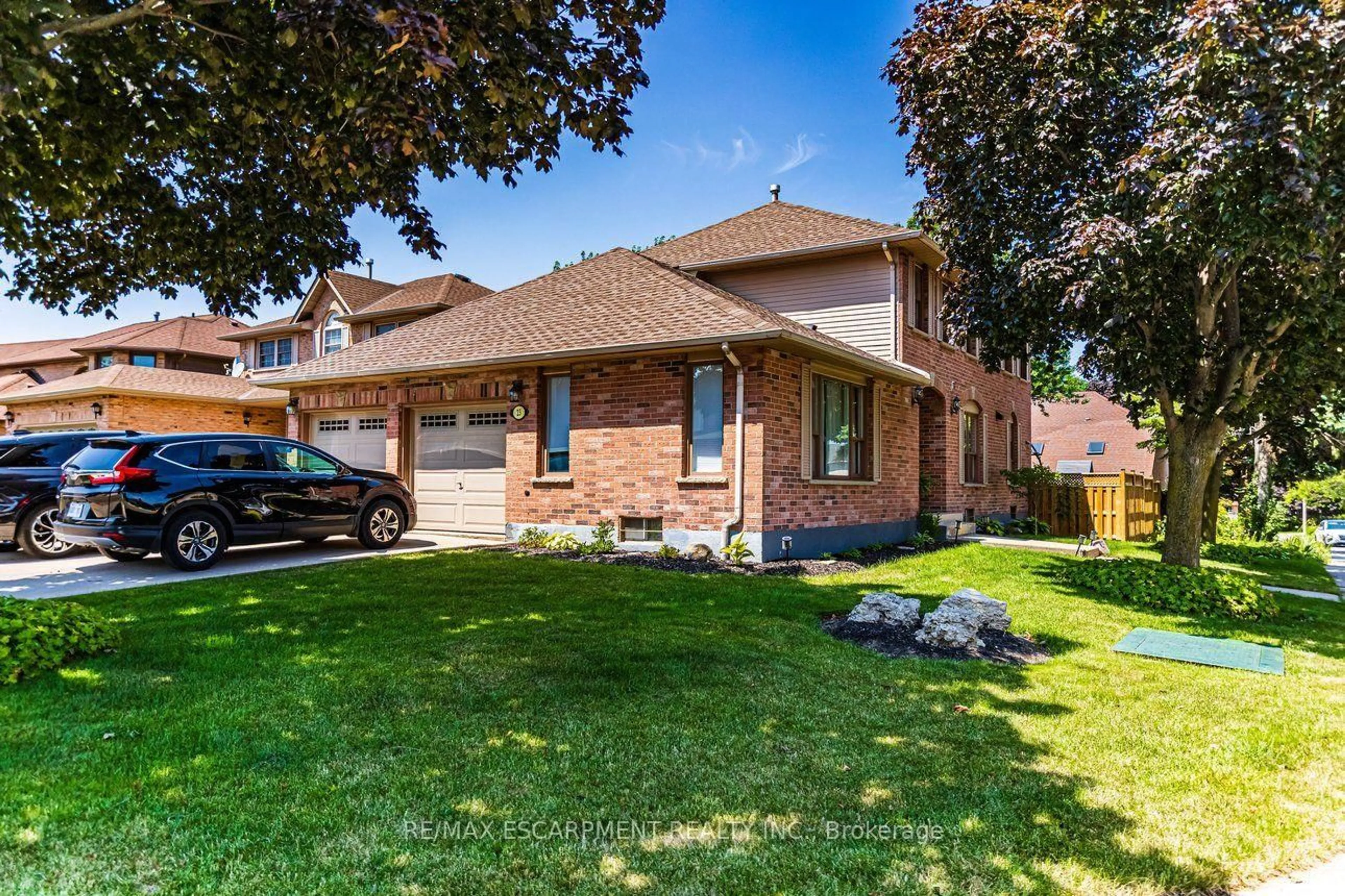 Home with brick exterior material, street for 23 Avonmore Crt, Hamilton Ontario L8W 3G8