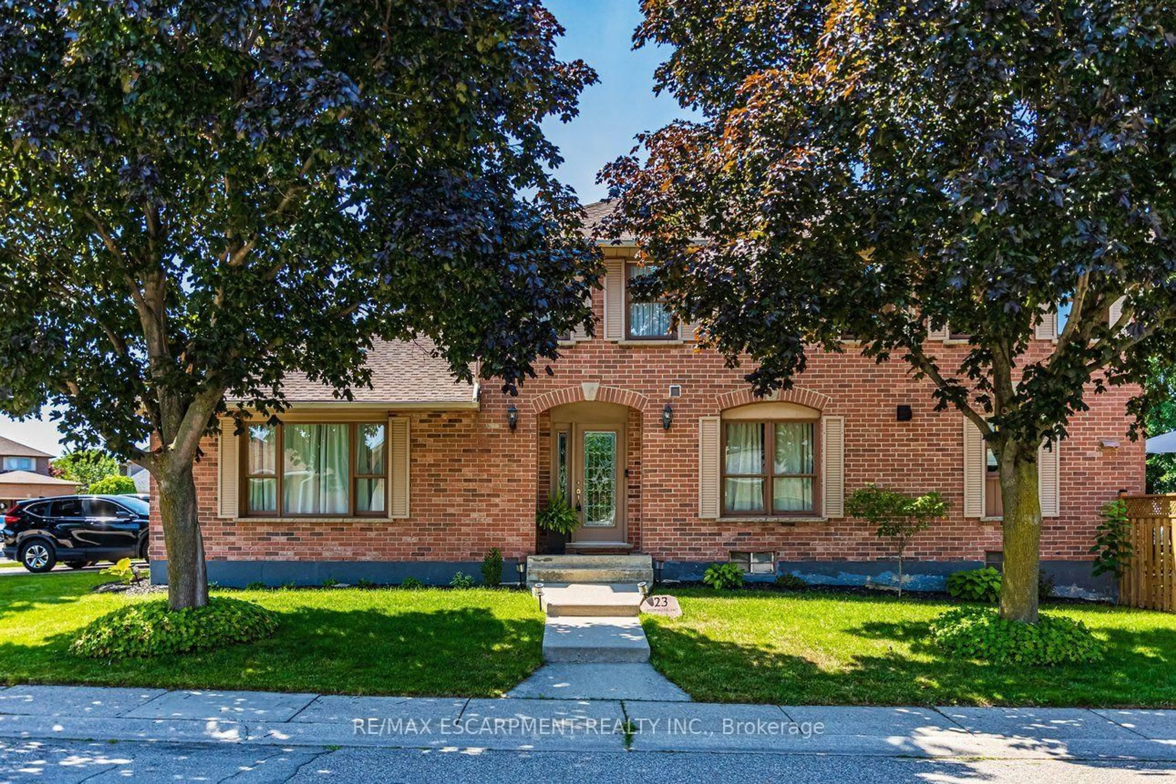 Home with brick exterior material, street for 23 Avonmore Crt, Hamilton Ontario L8W 3G8