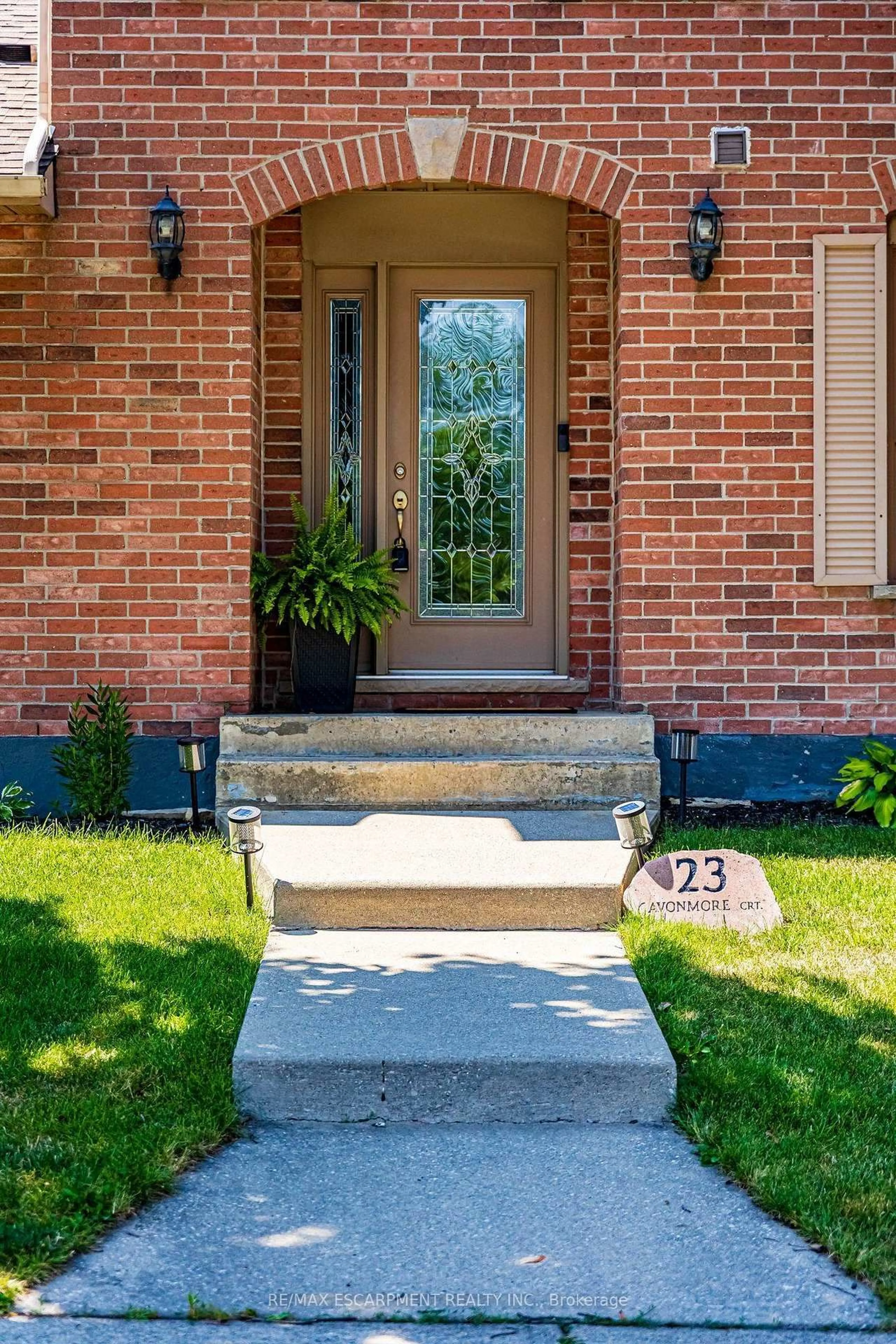 Home with brick exterior material, street for 23 Avonmore Crt, Hamilton Ontario L8W 3G8