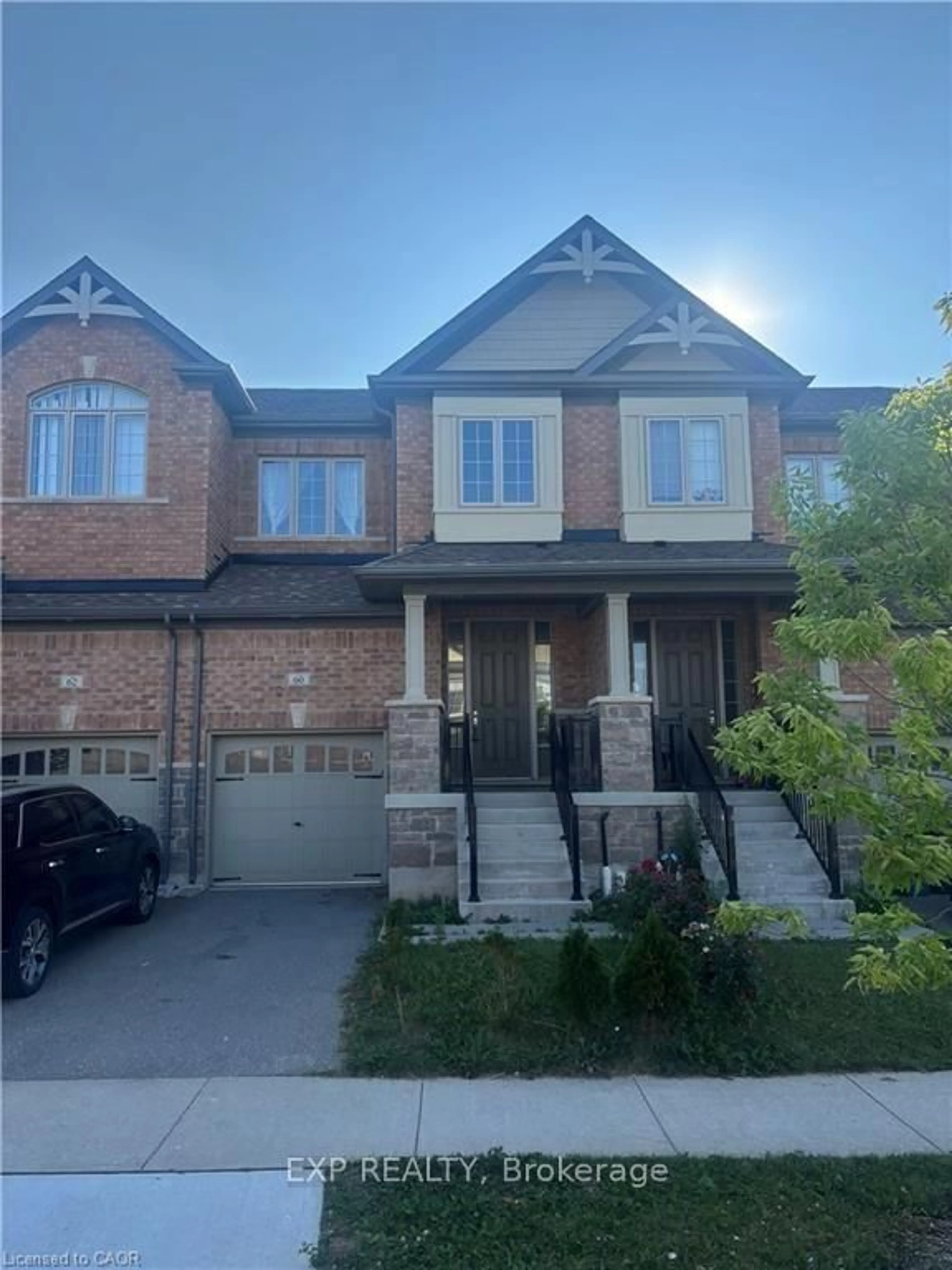 Home with brick exterior material, street for 60 Reistwood Dr, Kitchener Ontario N2P 2L1