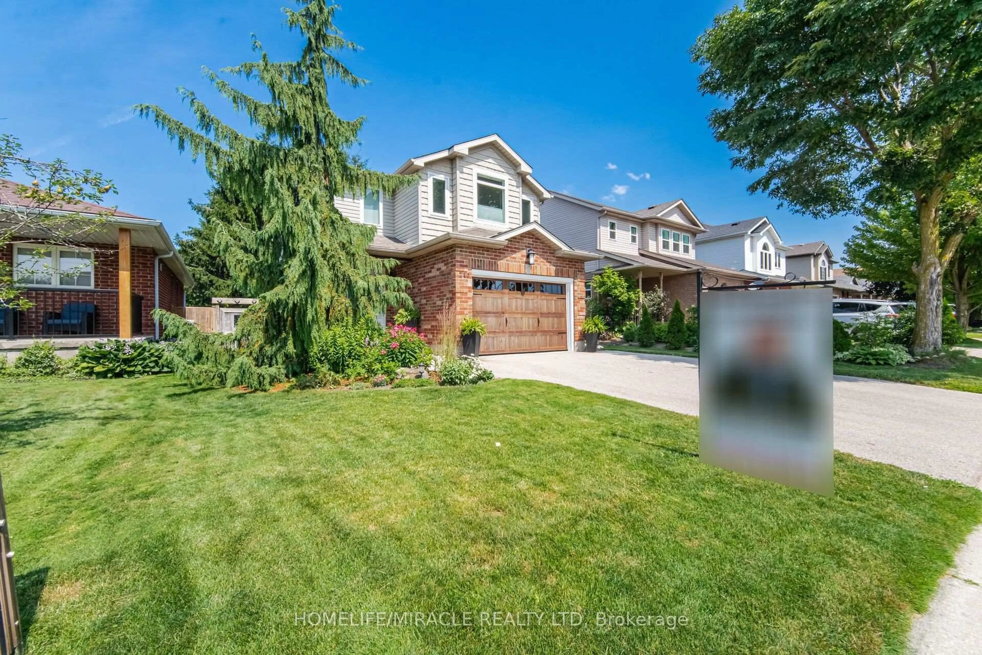 A pic from outside/outdoor area/front of a property/back of a property/a pic from drone, street for 240 Millburn Blvd, Centre Wellington Ontario N1M 3S3