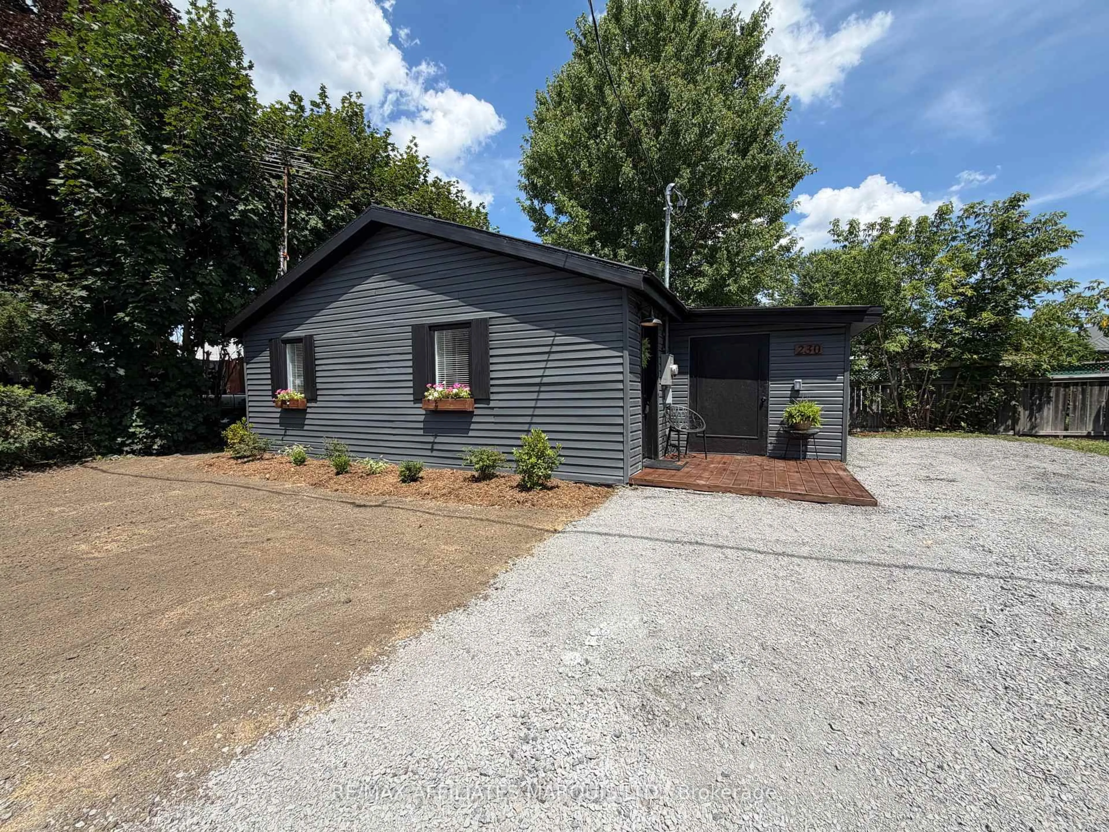 Home with vinyl exterior material, street for 230 Boundary Rd, North Glengarry Ontario K0C 1A0