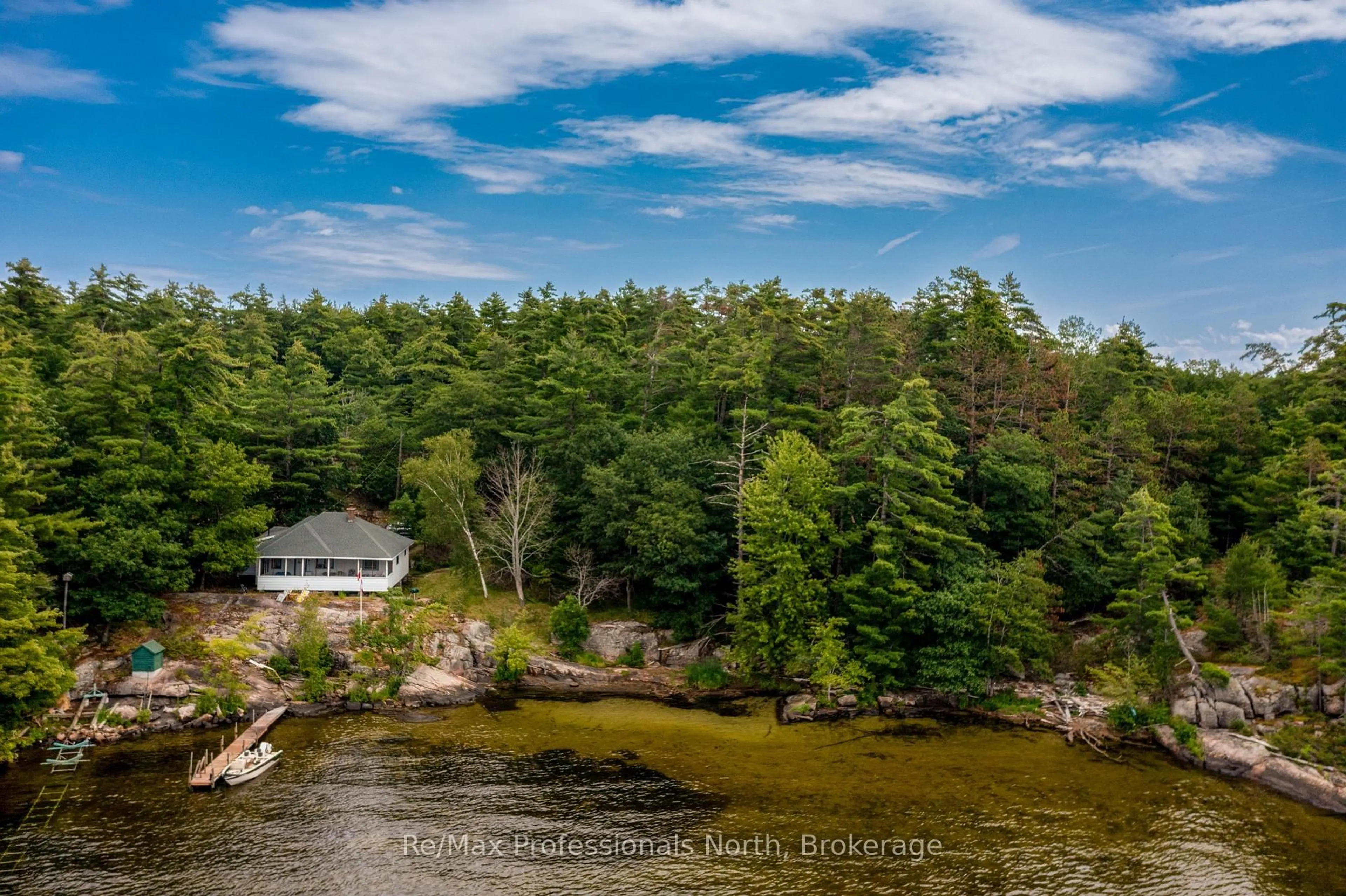 A pic from outside/outdoor area/front of a property/back of a property/a pic from drone, water/lake/river/ocean view for 1102 Unit 2 Clipsham Rd, Gravenhurst Ontario P0E 1G0