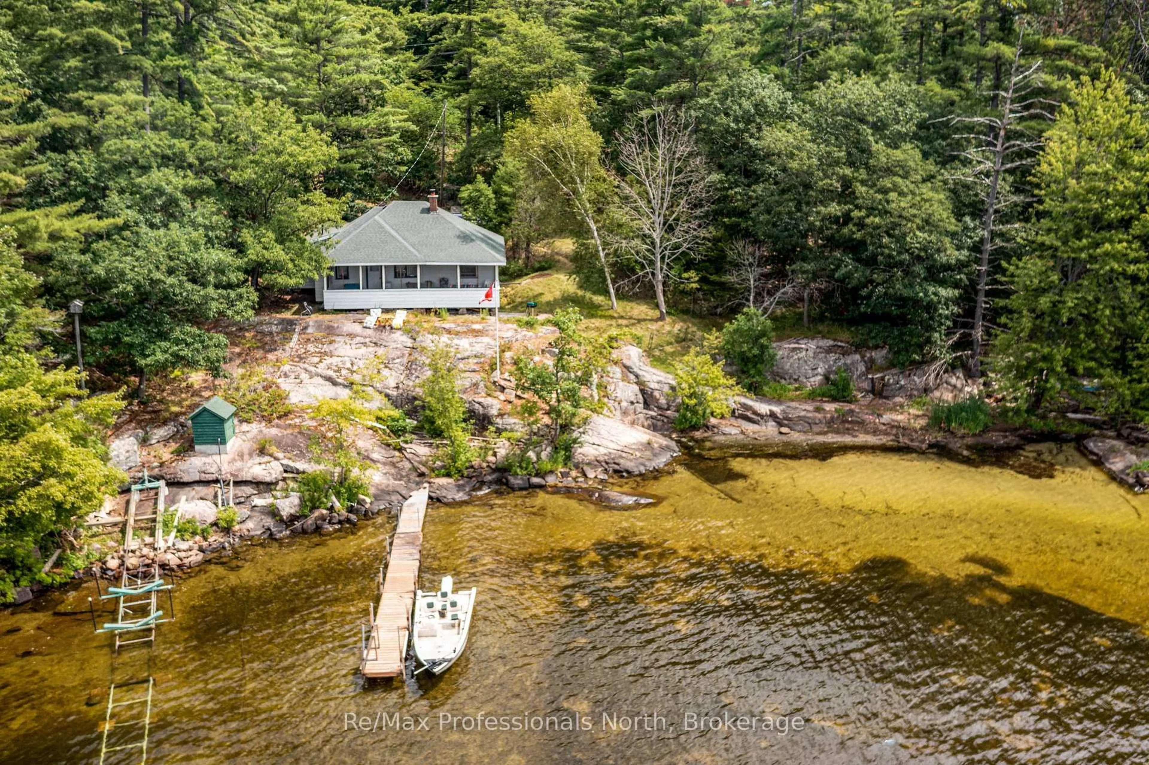 A pic from outside/outdoor area/front of a property/back of a property/a pic from drone, water/lake/river/ocean view for 1102 Unit 2 Clipsham Rd, Gravenhurst Ontario P0E 1G0
