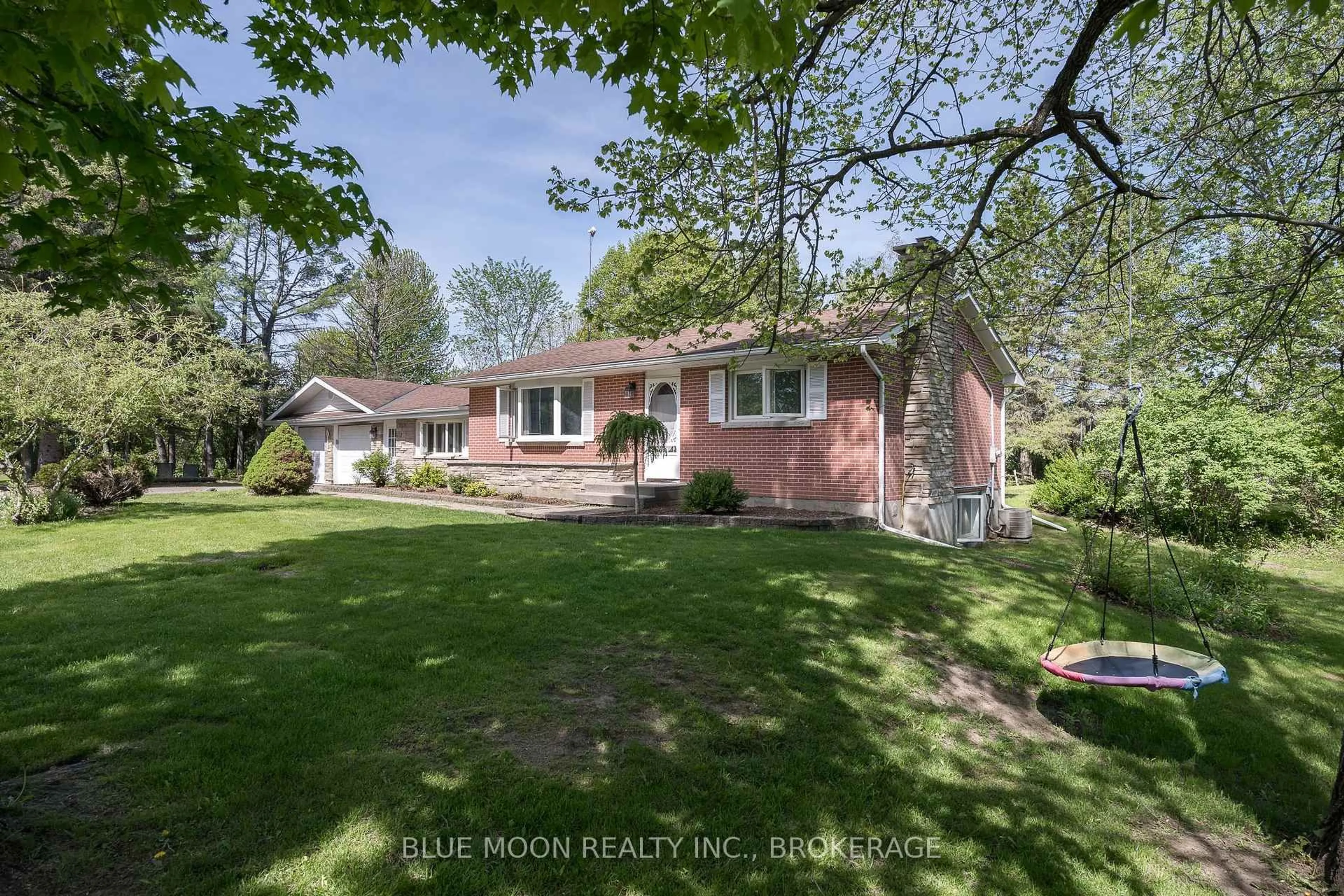 A pic from outside/outdoor area/front of a property/back of a property/a pic from drone, street for 2545 Leeman Rd, Mcdonalds Corners Ontario K0H 1M0
