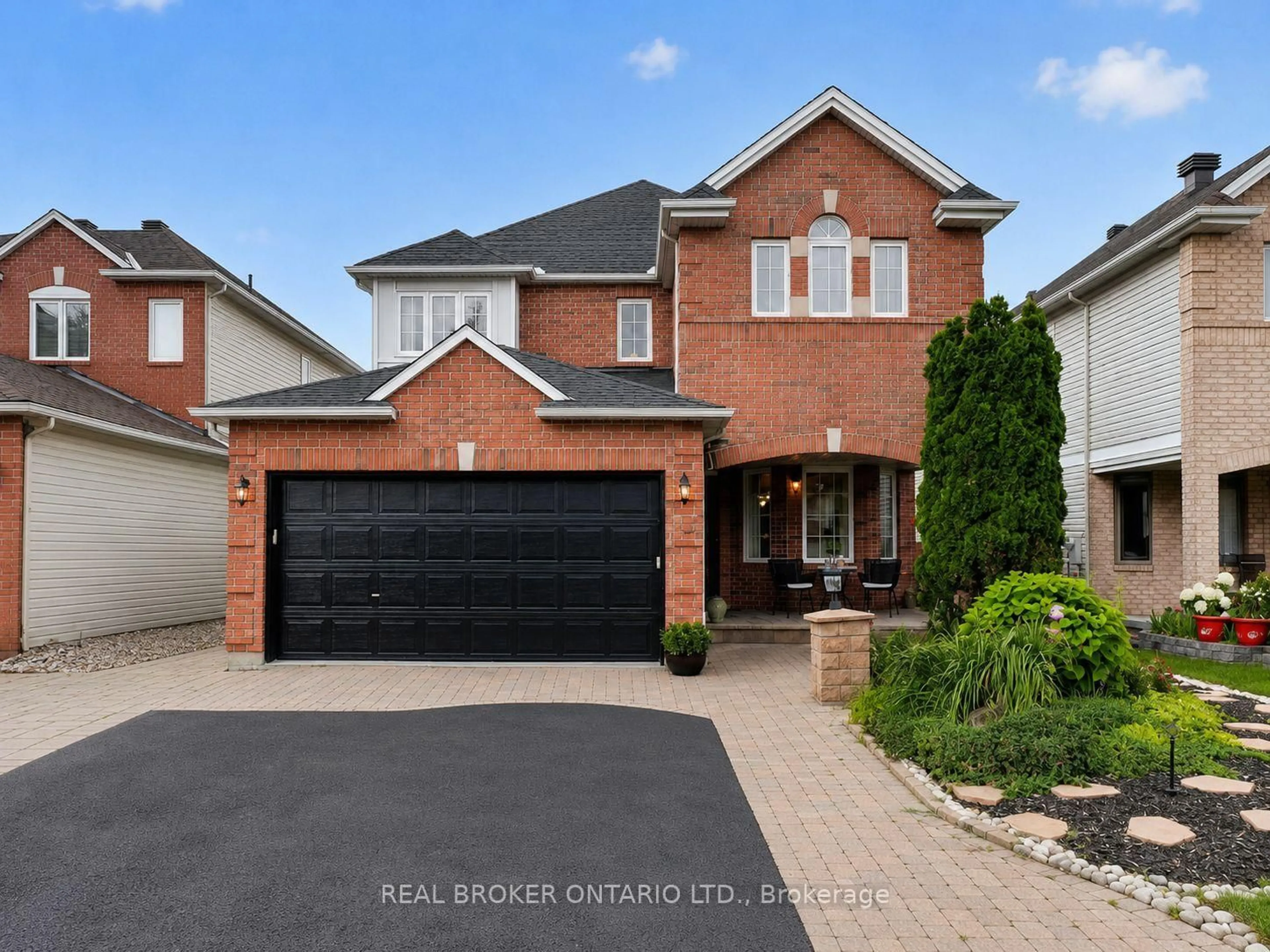 Home with brick exterior material, street for 157 Fairlop Way, Ottawa Ontario K2J 5B8
