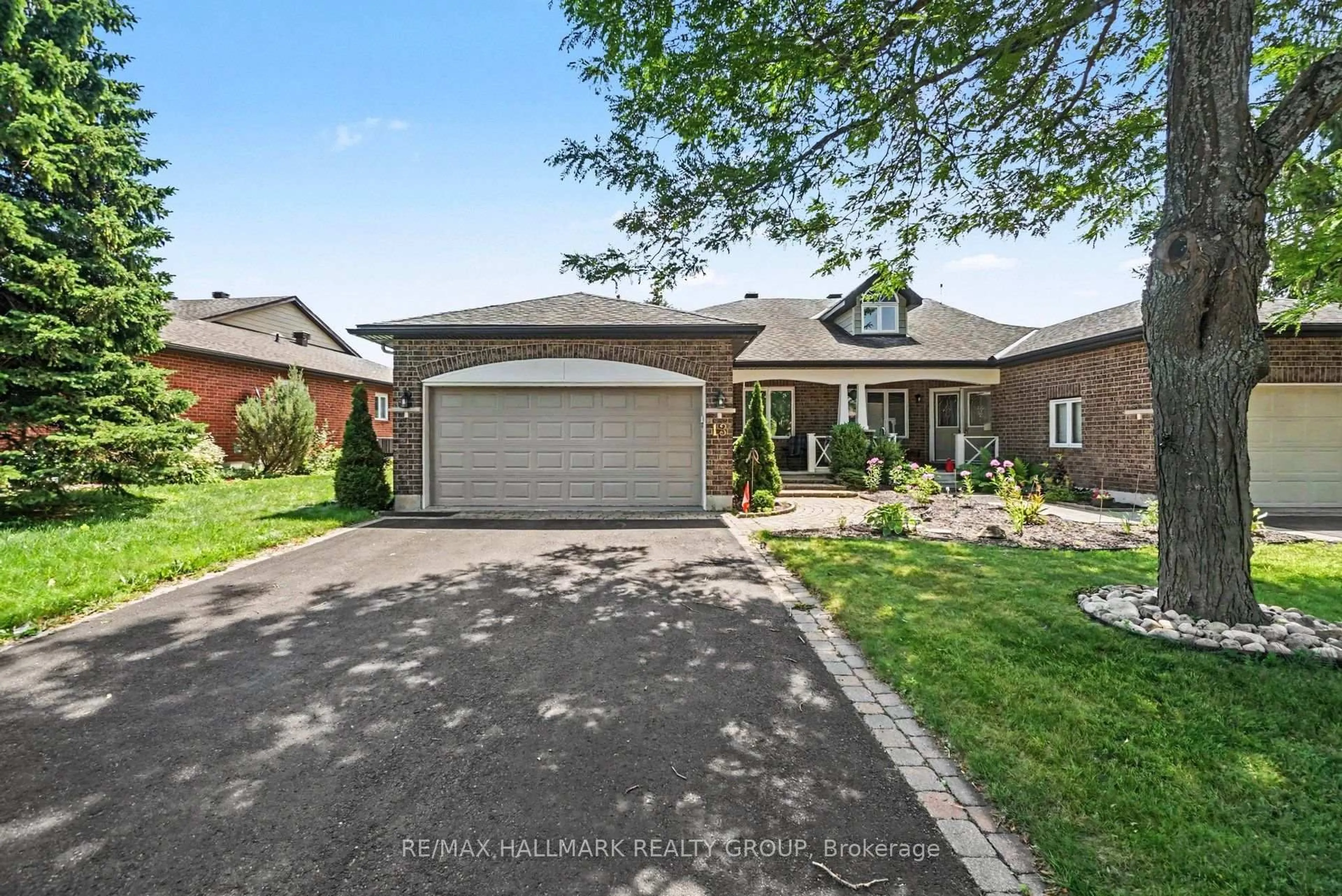 Home with brick exterior material, street for 13 Waterthrush Cres, Kanata Ontario K2M 2V2