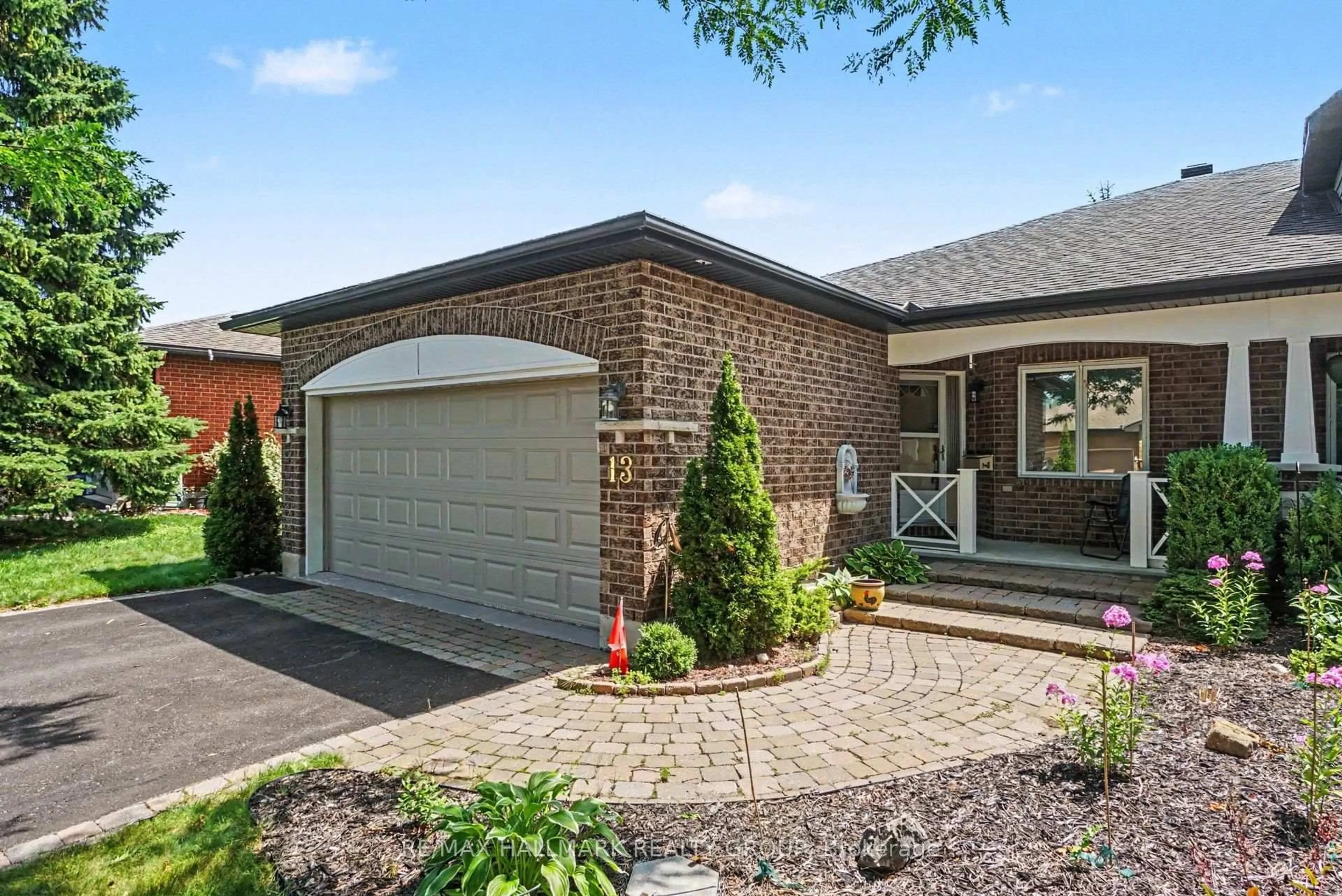Home with brick exterior material, street for 13 Waterthrush Cres, Kanata Ontario K2M 2V2