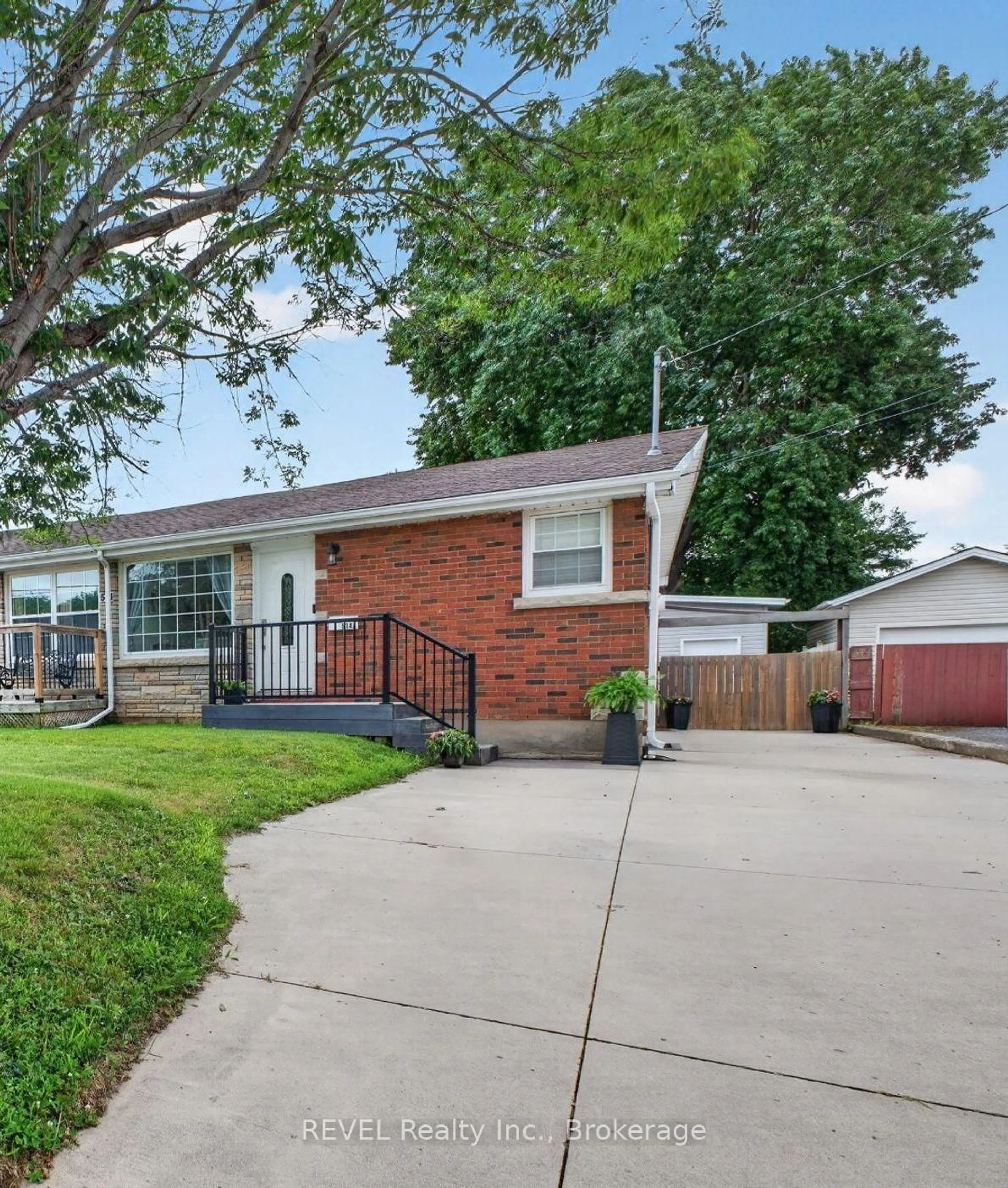 Home with brick exterior material, street for 514 - A Scott St #A, St. Catharines Ontario L2M 3X2