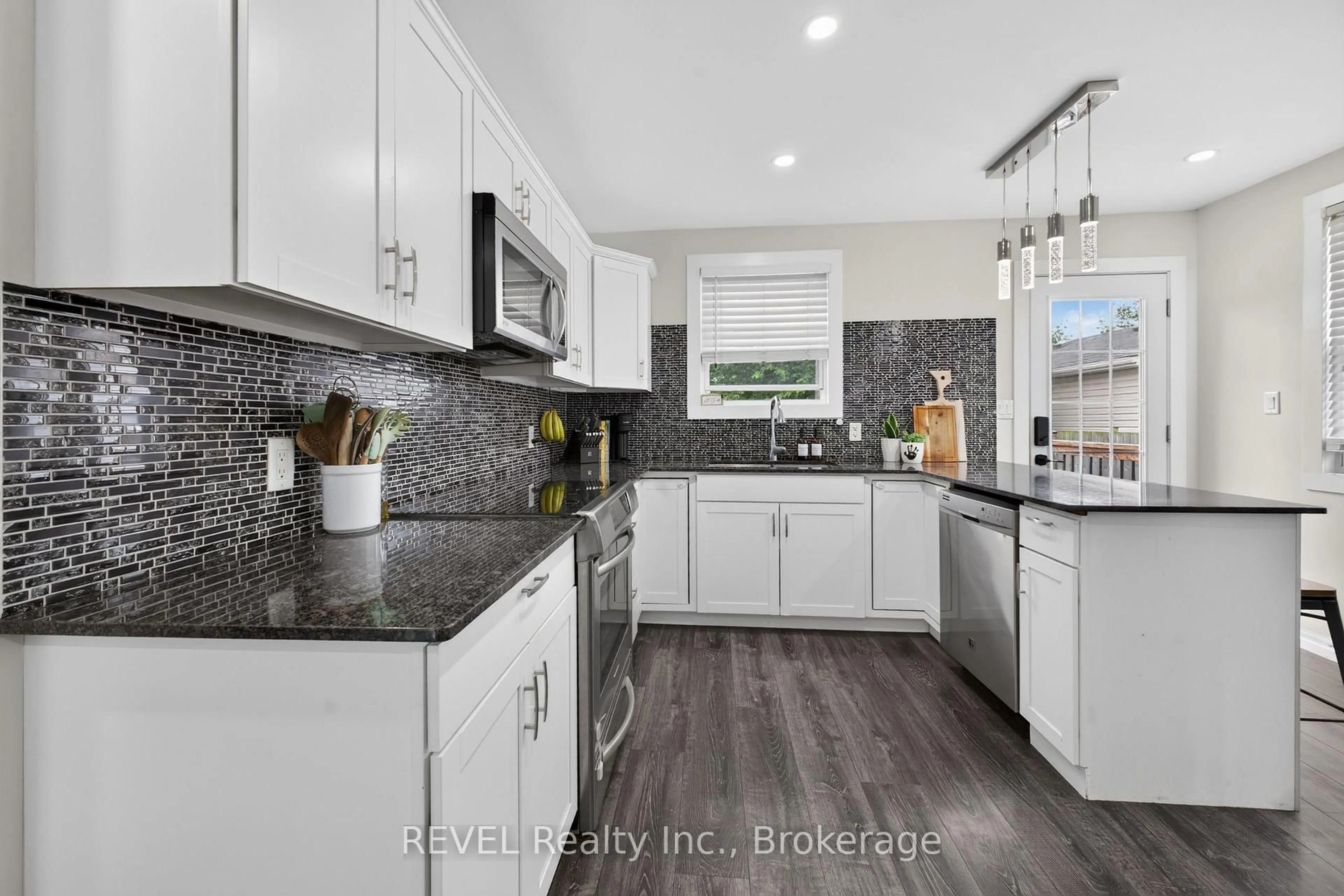 Open concept kitchen, ceramic/tile floor for 514 - A Scott St #A, St. Catharines Ontario L2M 3X2