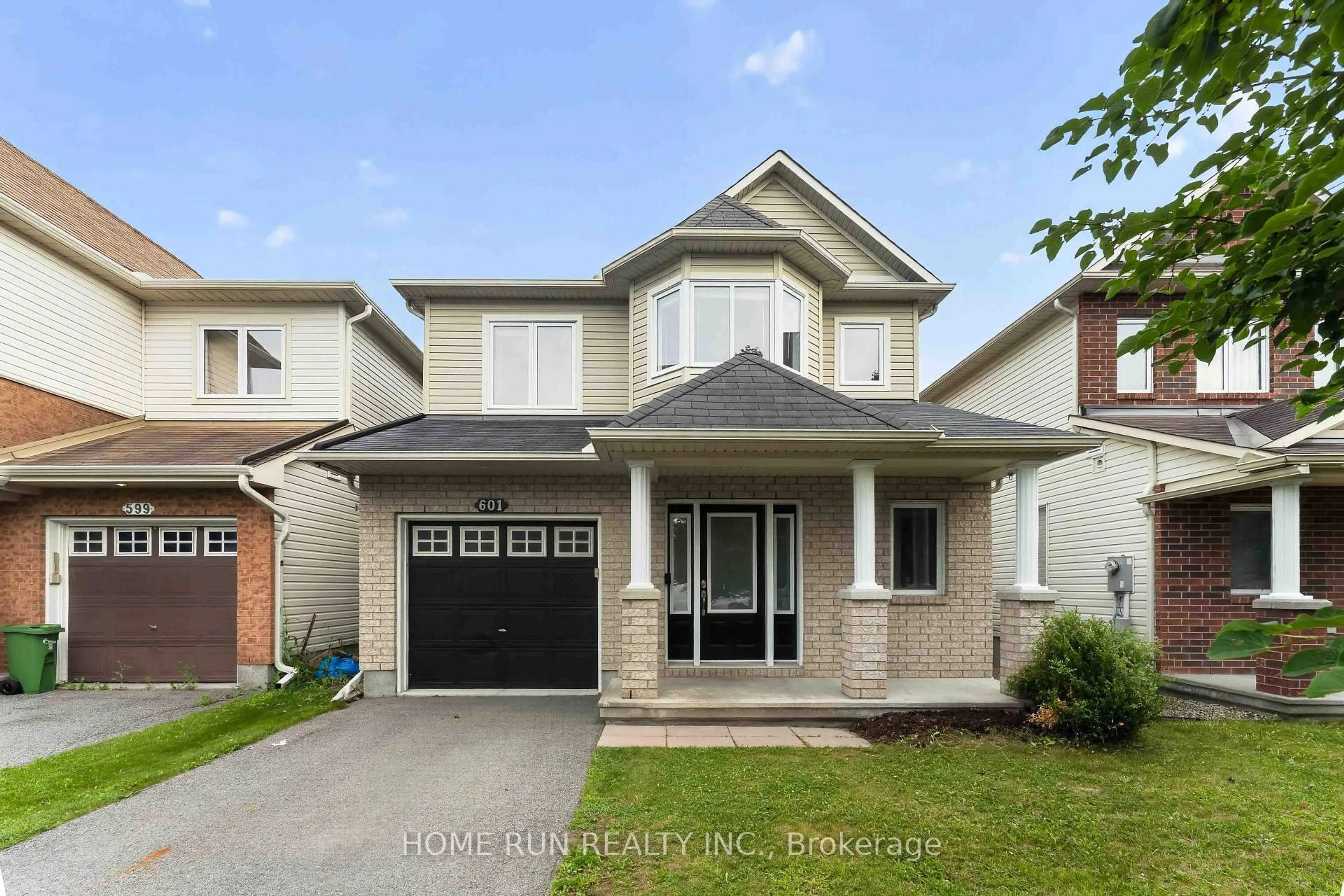 Home with brick exterior material, street for 601 Paul Metivier Dr, Ottawa Ontario K2J 0X9