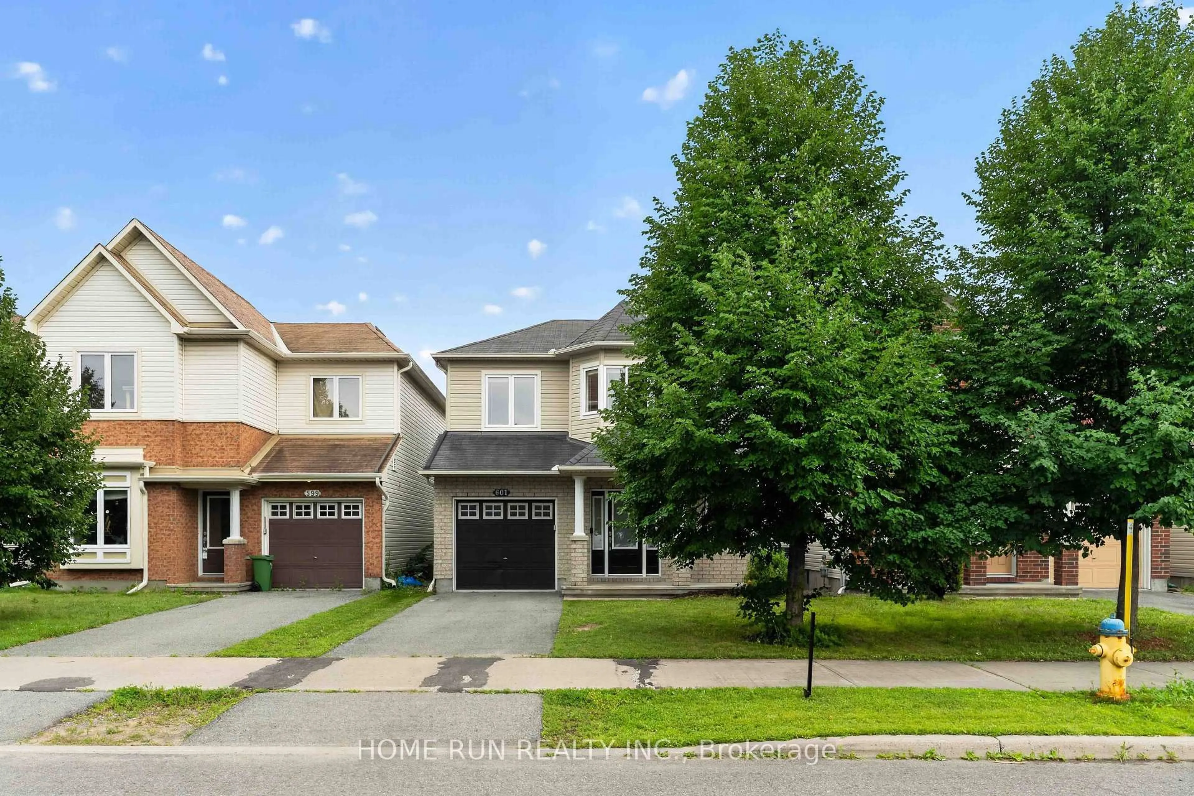 A pic from outside/outdoor area/front of a property/back of a property/a pic from drone, street for 601 Paul Metivier Dr, Ottawa Ontario K2J 0X9