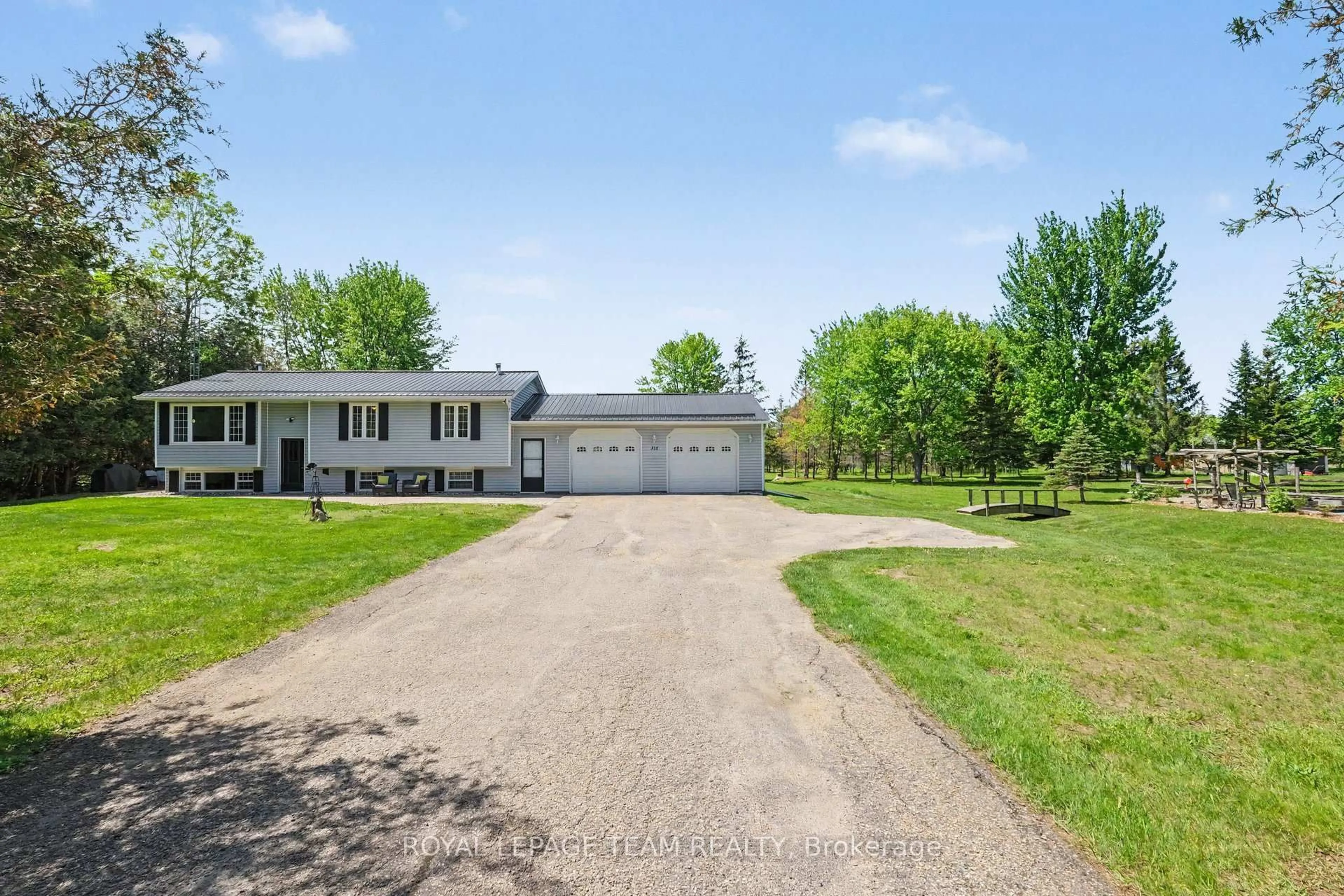 A pic from outside/outdoor area/front of a property/back of a property/a pic from drone, street for 316 County Road 25, North Grenville Ontario K0G 1S0