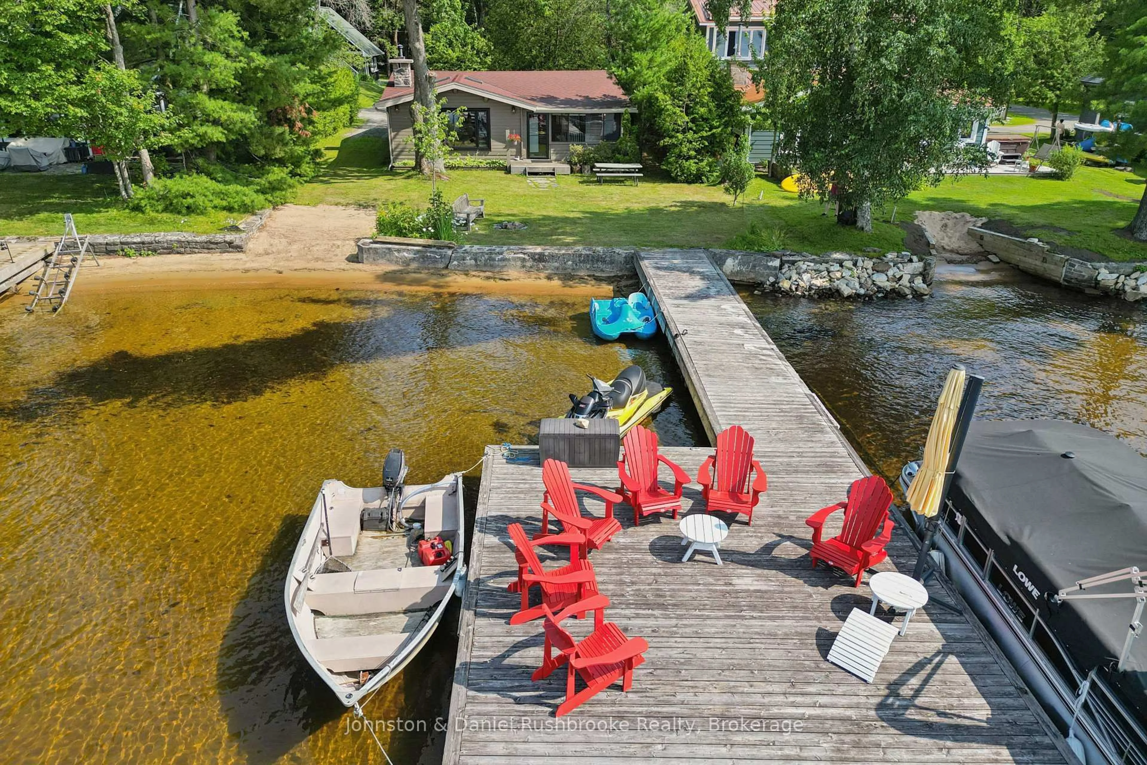 A pic from outside/outdoor area/front of a property/back of a property/a pic from drone, water/lake/river/ocean view for 1046 Golden Point Rd, Bracebridge Ontario P1L 1W8