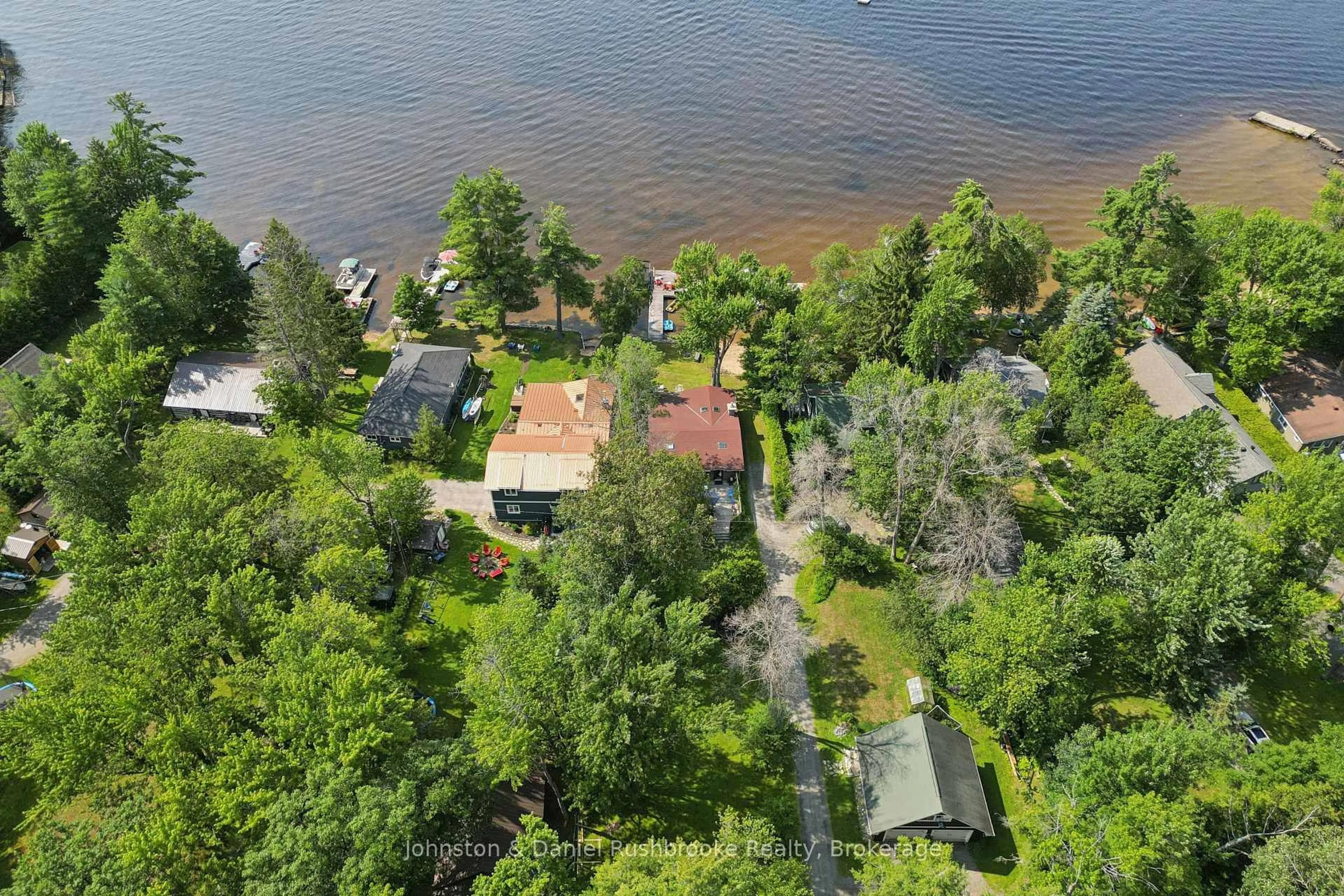 A pic from outside/outdoor area/front of a property/back of a property/a pic from drone, water/lake/river/ocean view for 1046 Golden Point Rd, Bracebridge Ontario P1L 1W8