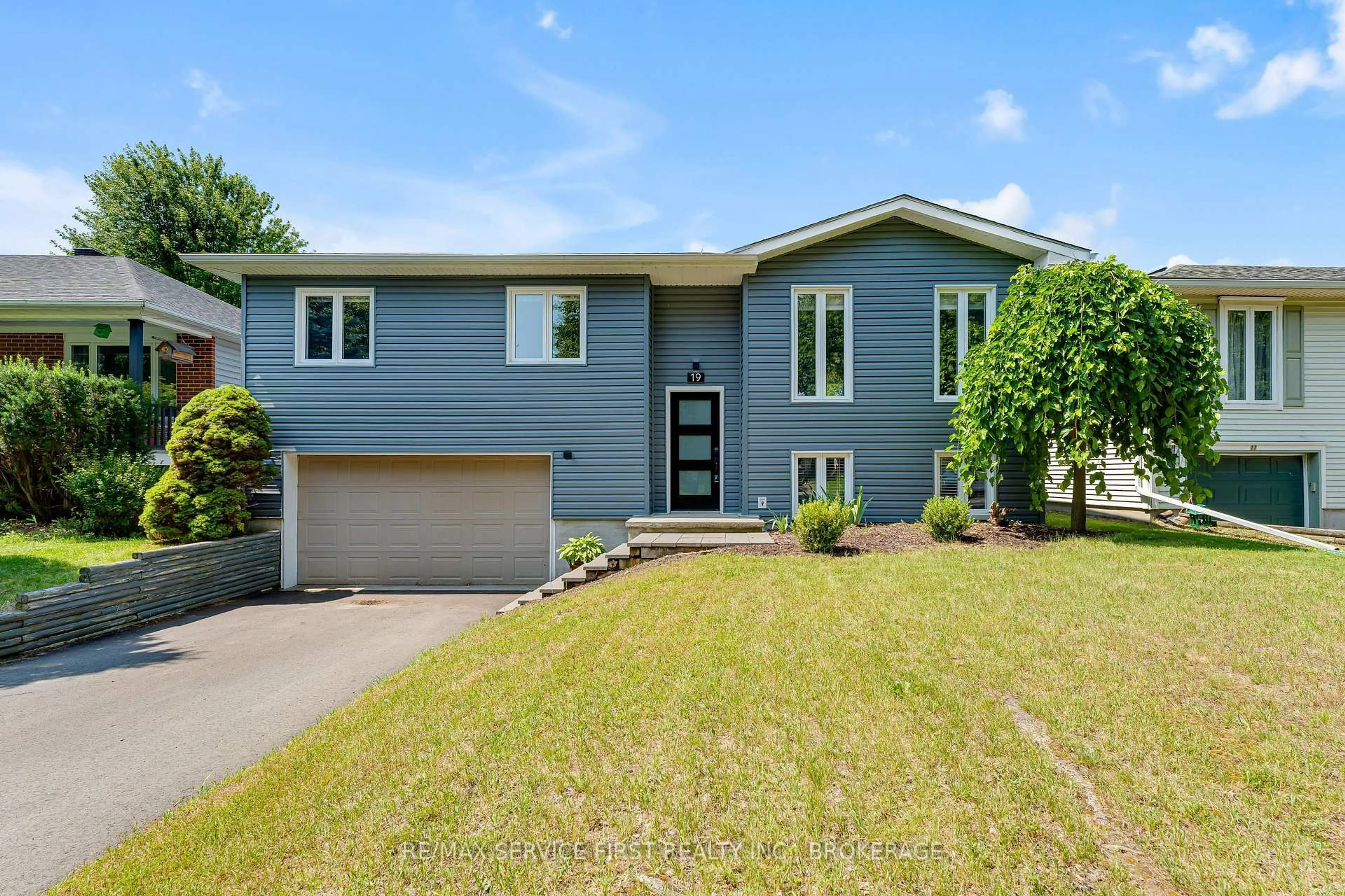 Home with vinyl exterior material, street for 19 Heritage Dr, Bath Ontario K0H 1G0