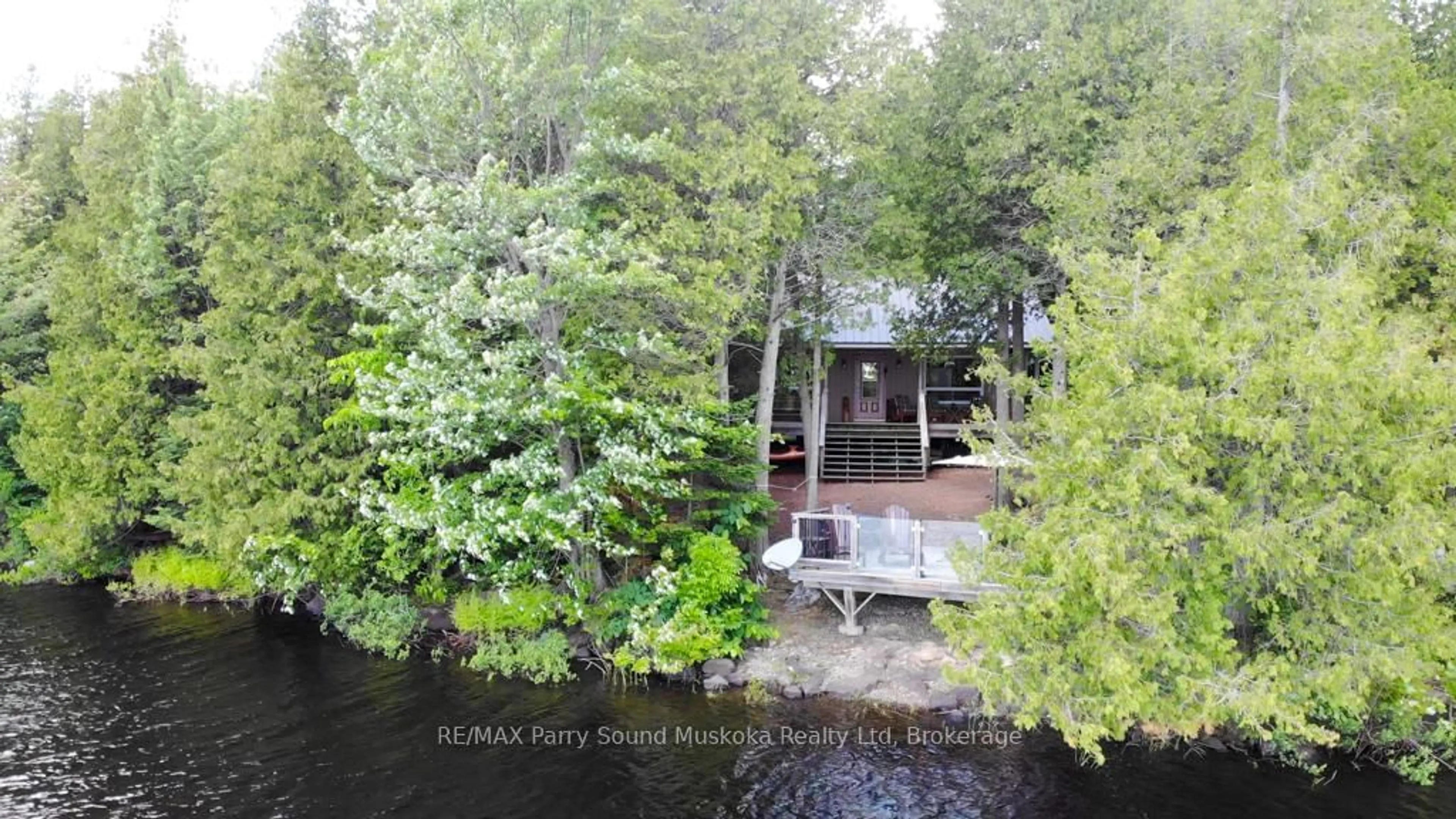 A pic from outside/outdoor area/front of a property/back of a property/a pic from drone, water/lake/river/ocean view for 634 WA Whitestone Lake, Whitestone Ontario P0A 1G0