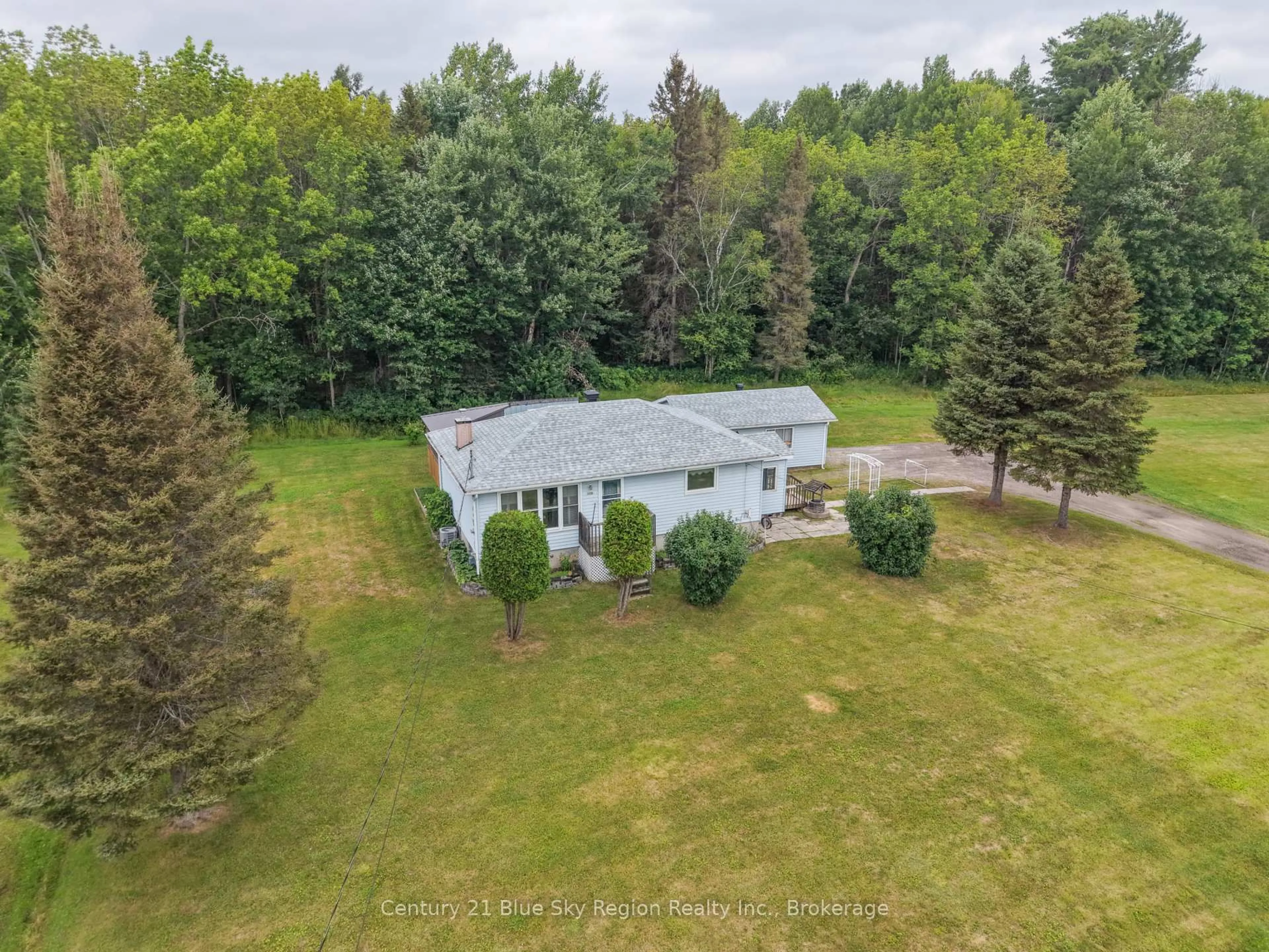 A pic from outside/outdoor area/front of a property/back of a property/a pic from drone, forest/trees view for 1272 Lakeshore Dr, North Bay Ontario P1B 8Z4
